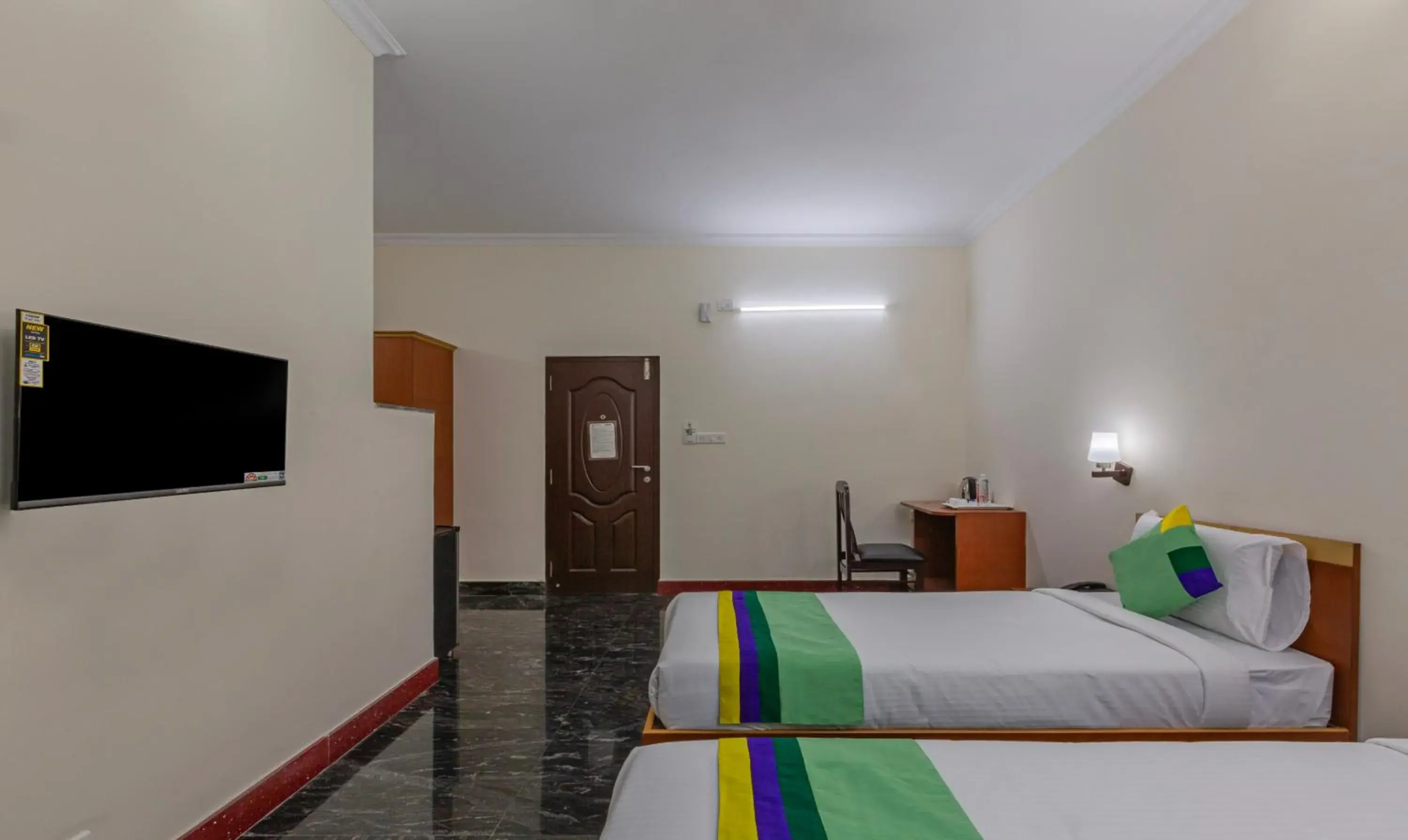 Bed in Treebo Akshaya Residency Bed in Treebo Akshaya Residency