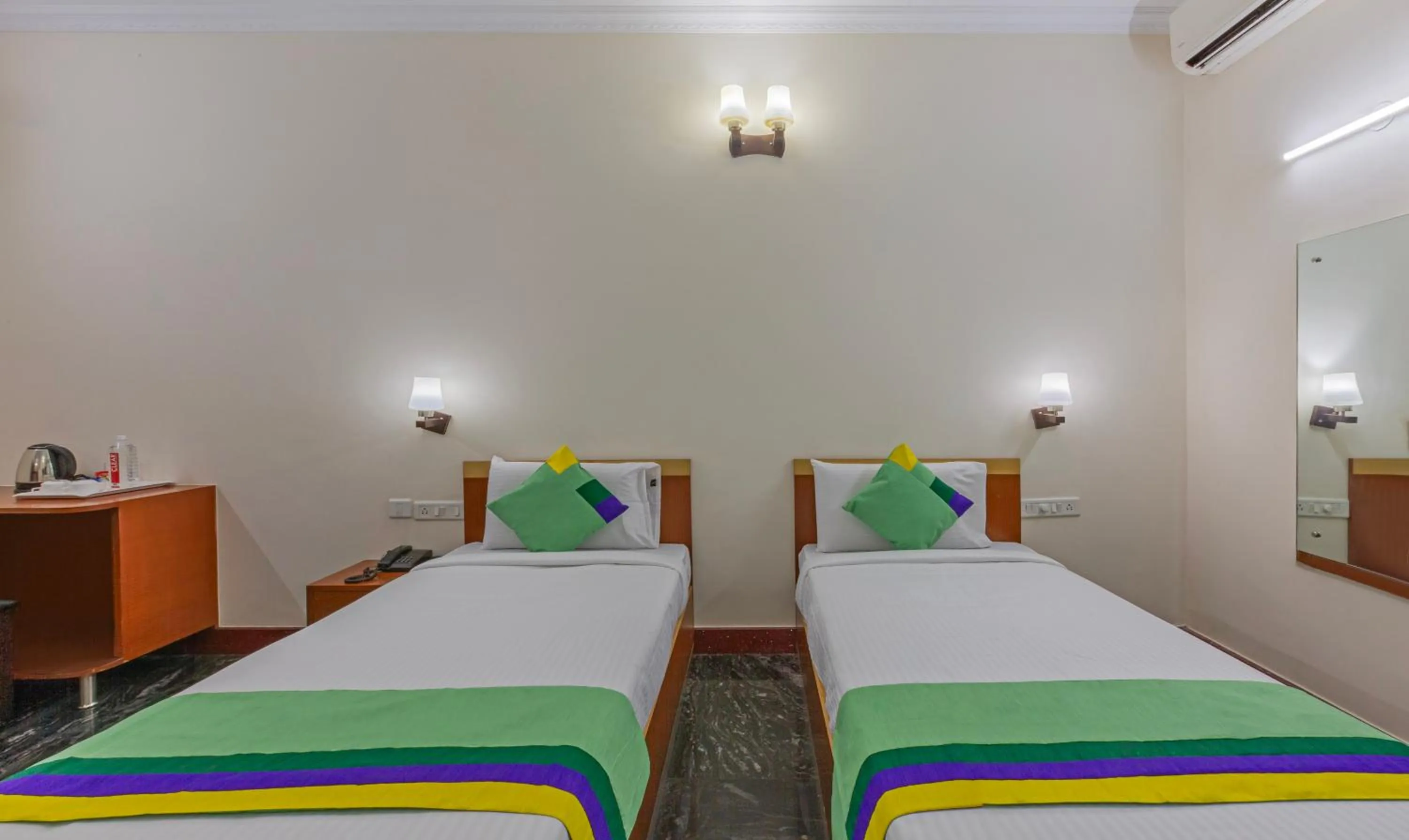 Bed in Treebo Akshaya Residency