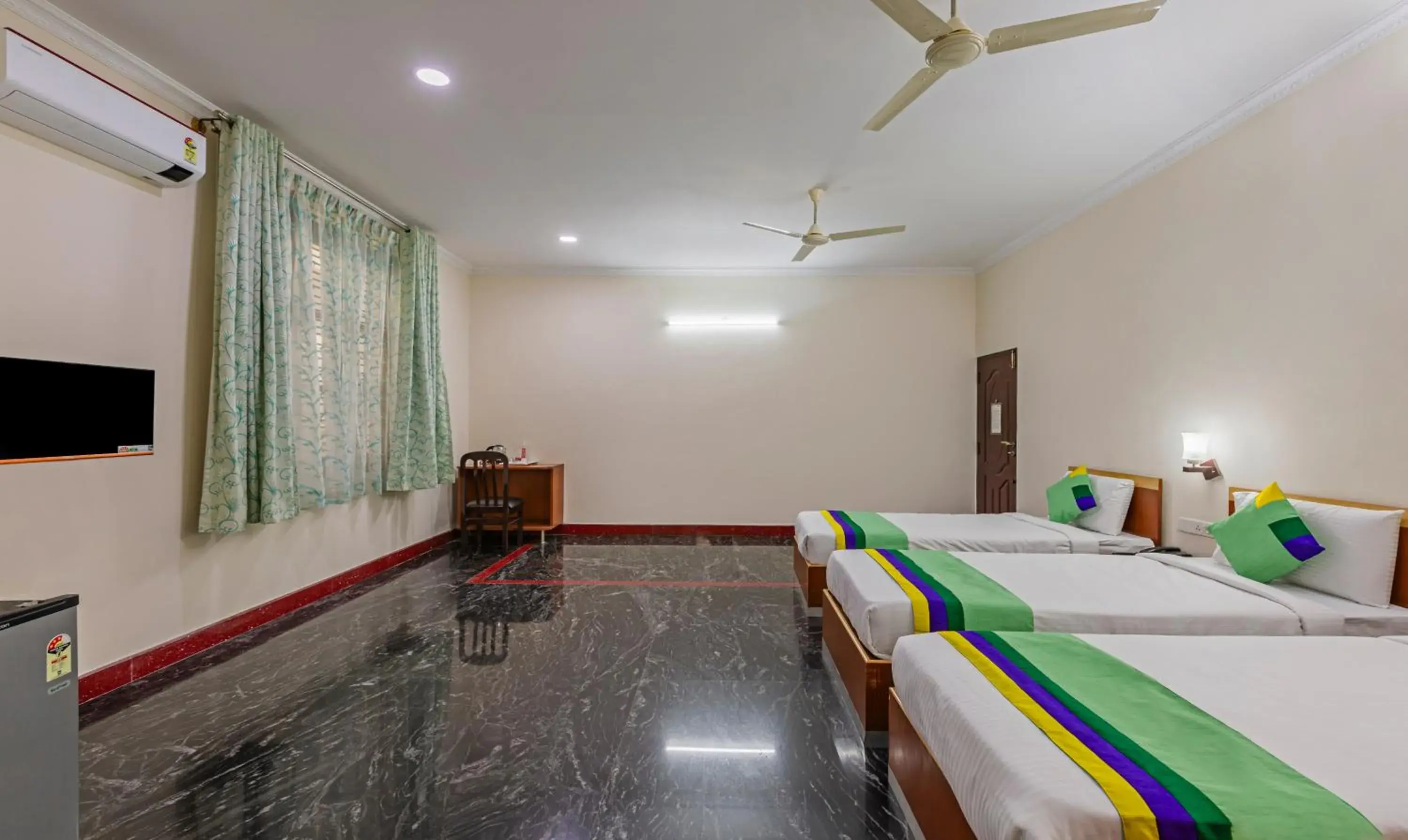 Bed in Treebo Akshaya Residency Bed in Treebo Akshaya Residency