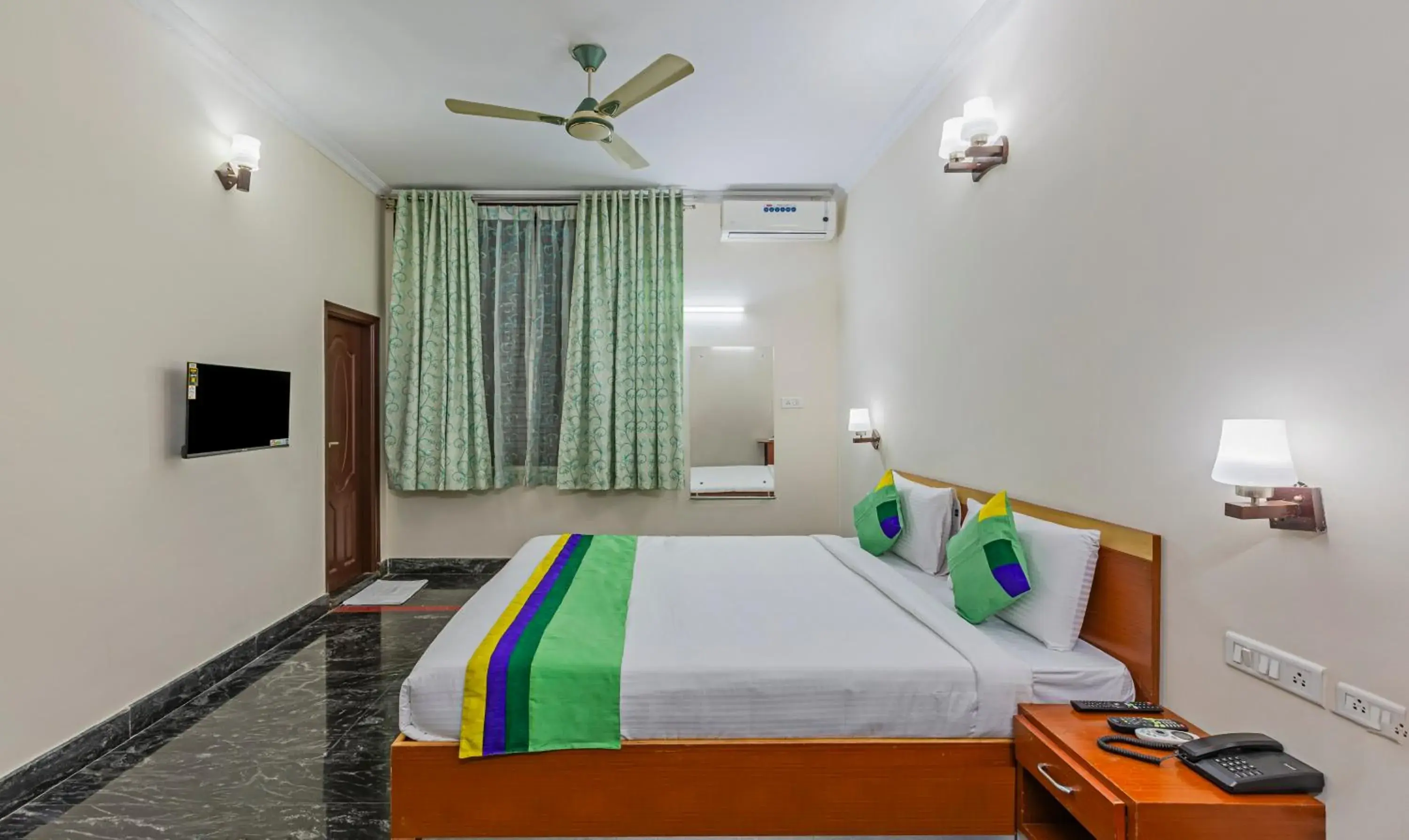 Bed in Treebo Akshaya Residency Bed in Treebo Akshaya Residency