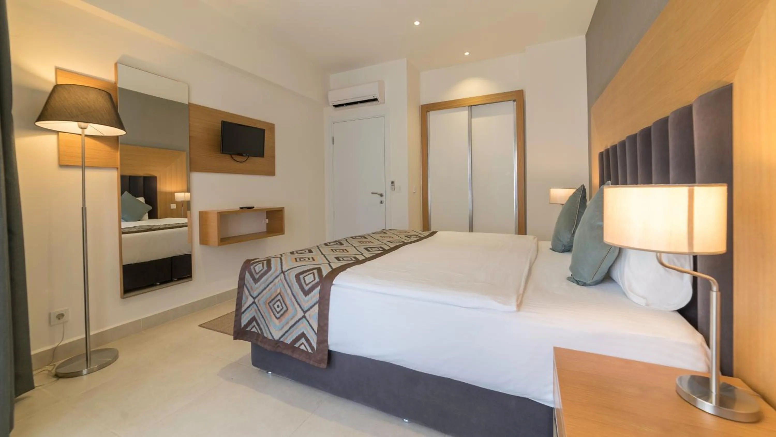 Bedroom in Ramada Resort Kusadasi & Golf