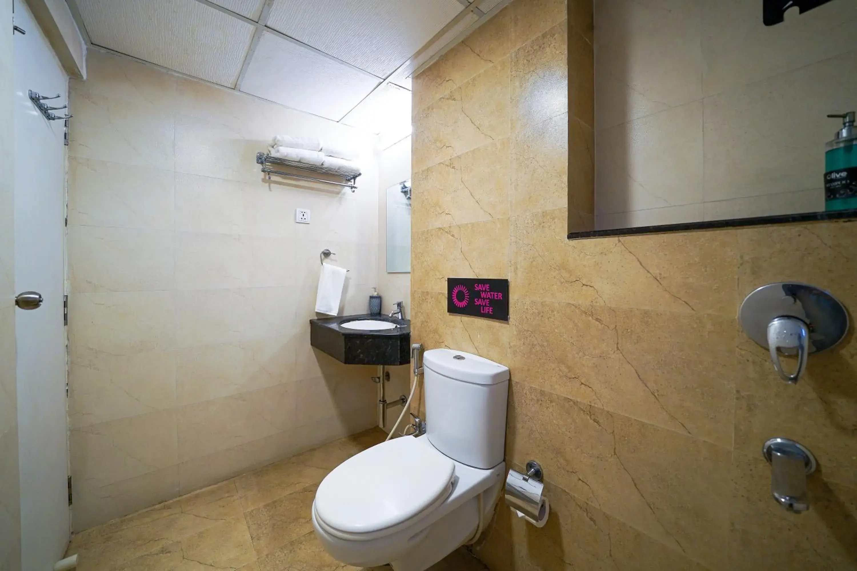 Toilet in Olive Hotel Electronic City by Embassy Group Toilet in Olive Hotel Electronic City by Embassy Group