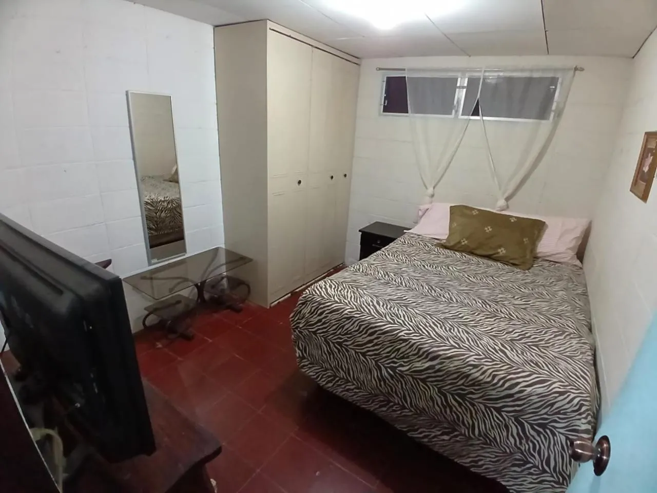 Bed in Santa Tecla Acogedora Guest House