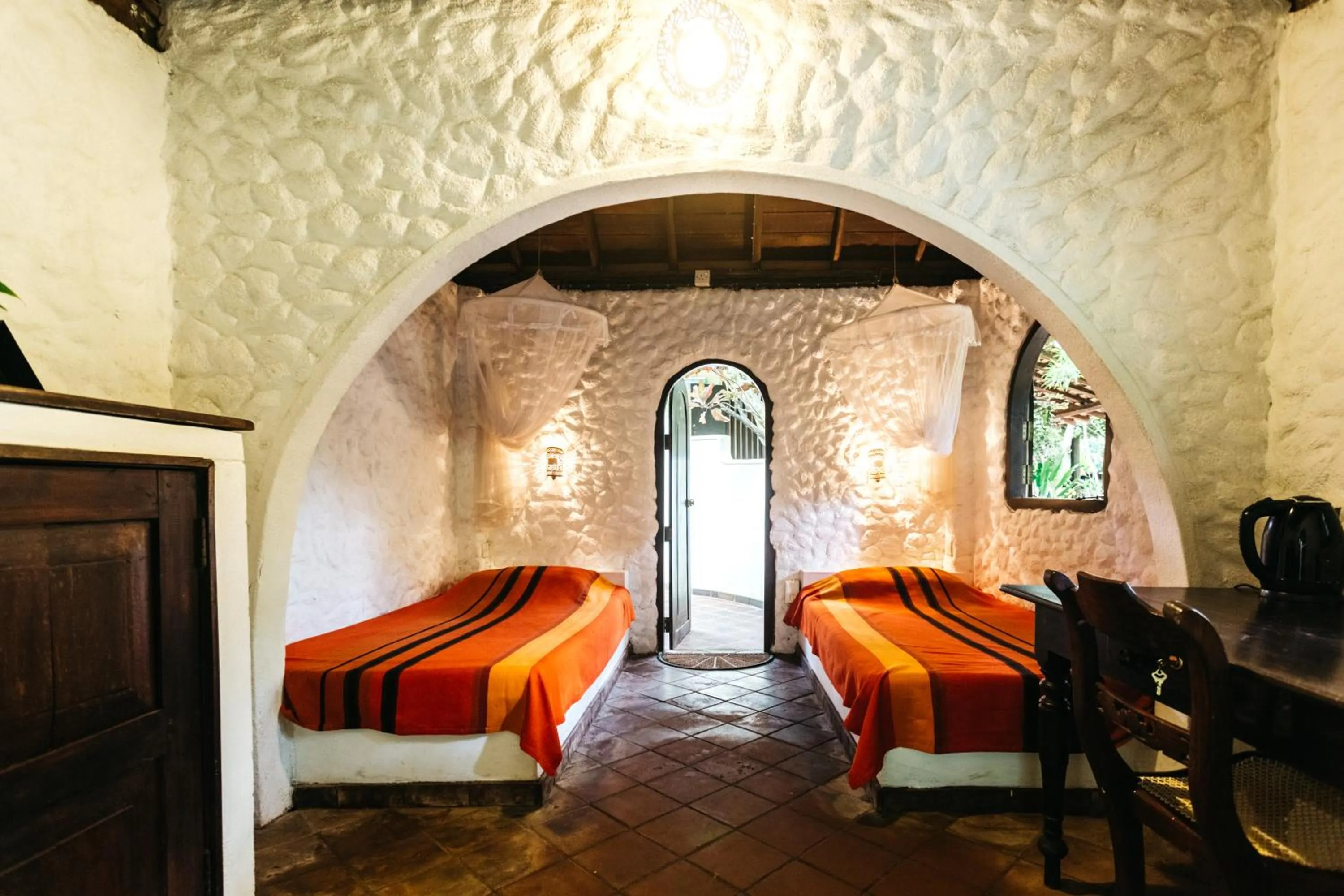 Bed in Secret Garden Villa - Unawatuna