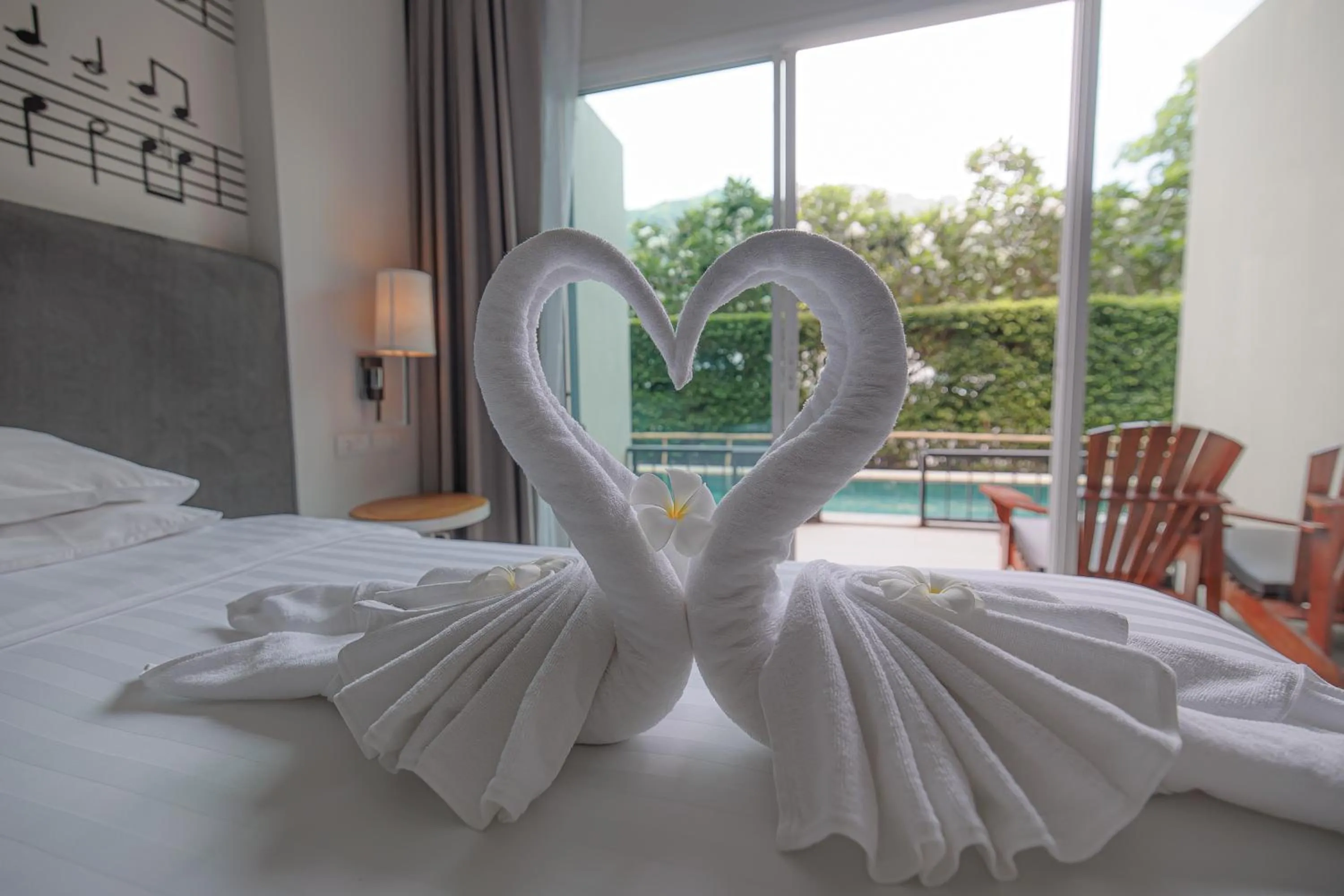 Bed in The Melody Phuket - SHA Extra Plus