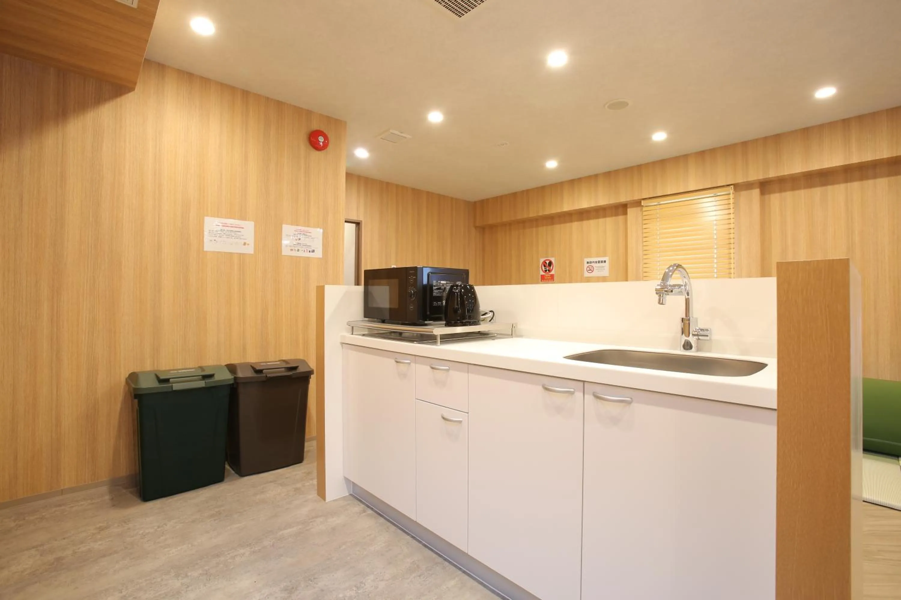 Kitchen or kitchenette in OHWA hostel minowa station