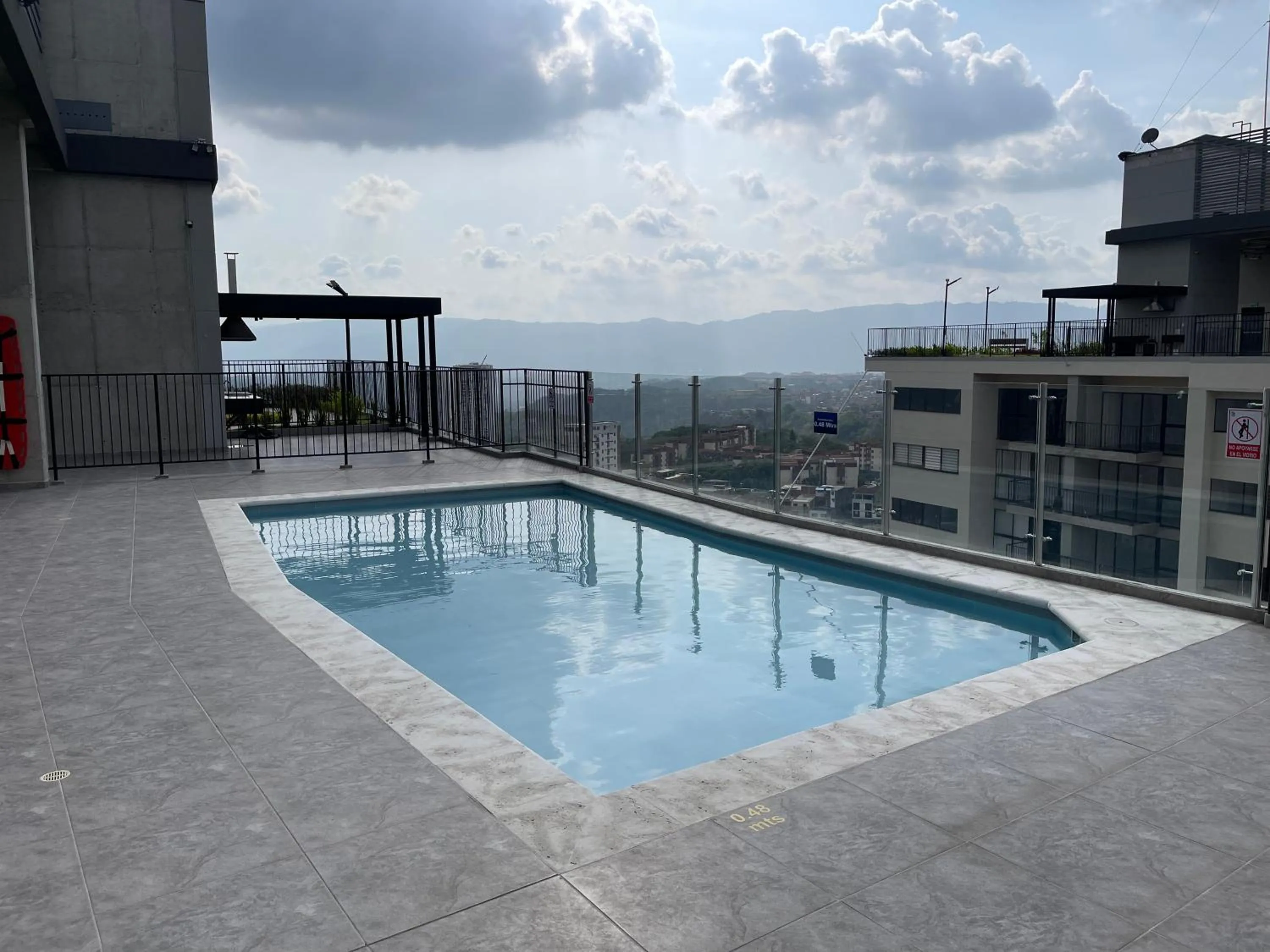 Pool view in Acogedor apartamento cerca de clínica en F/blanca