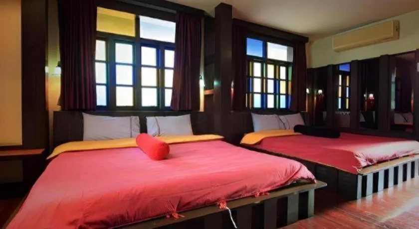 Bed in Pak Ping Ing Tang Boutique Hotel