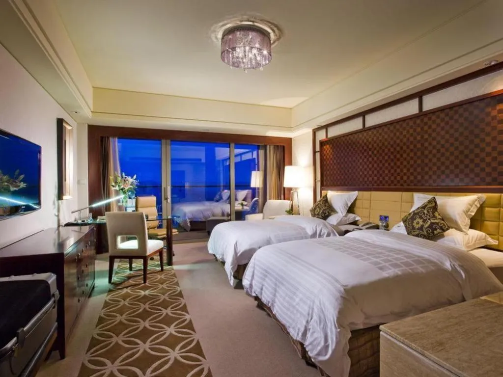 Bed in Shangyu International Hotel