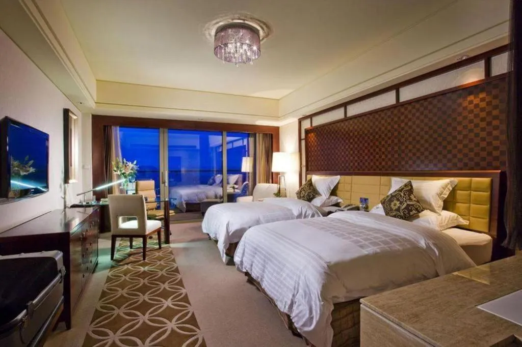 Bed in Shangyu International Hotel