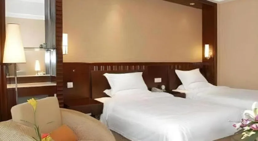Bed in Shangyu International Hotel