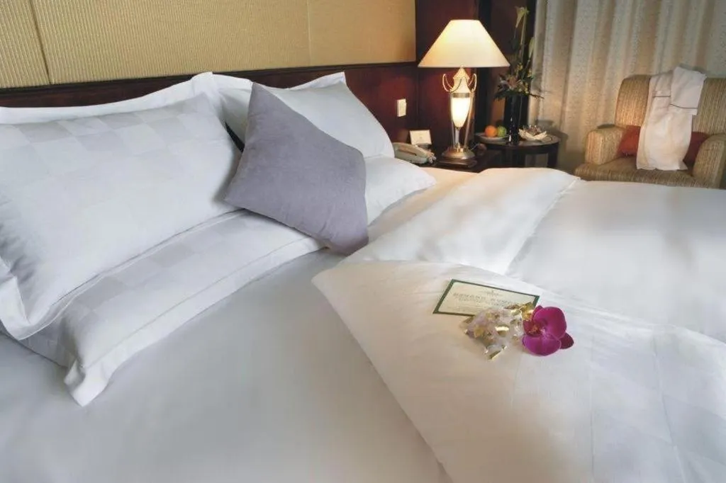 Bed in Shangyu International Hotel