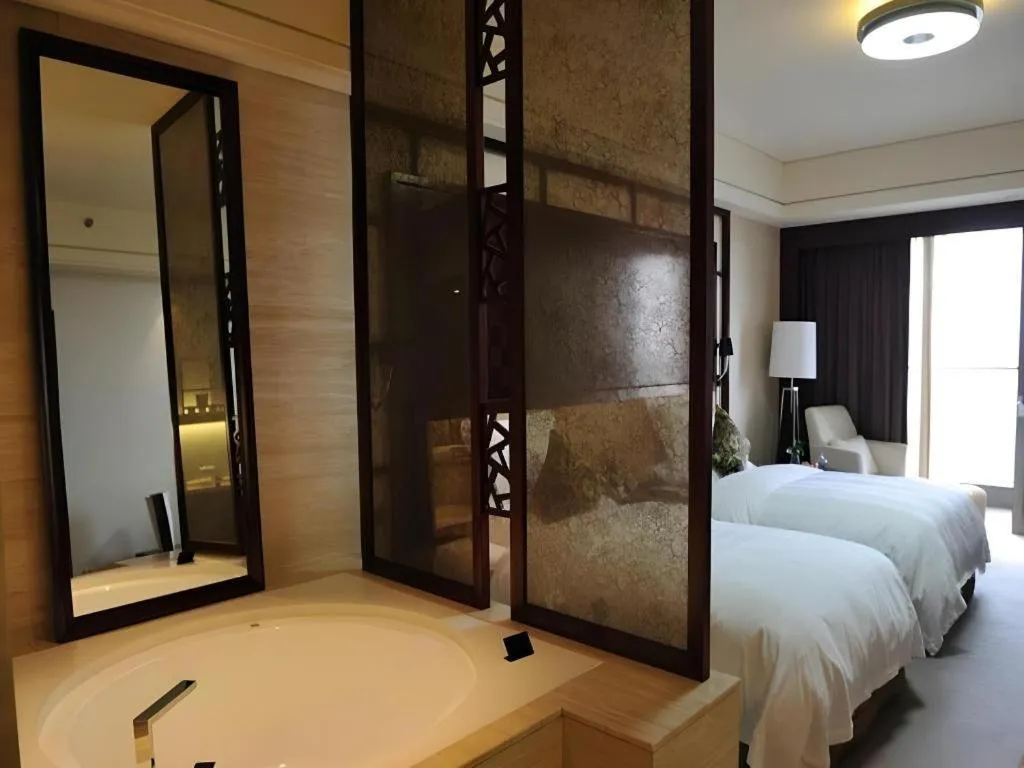 Bed in Shangyu International Hotel