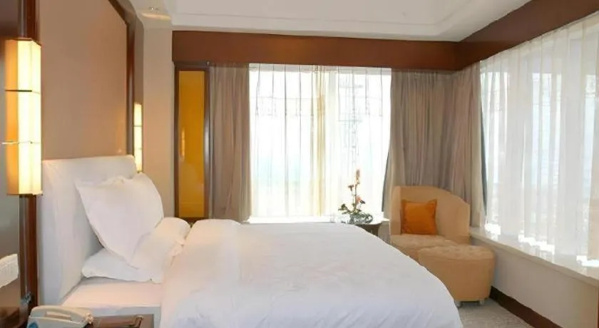 Bed in Shangyu International Hotel