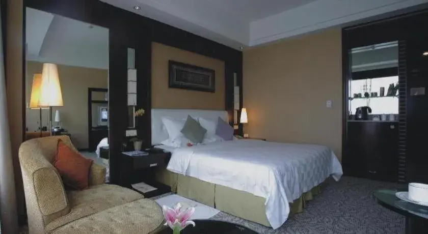 Bed in Shangyu International Hotel Bed in Shangyu International Hotel