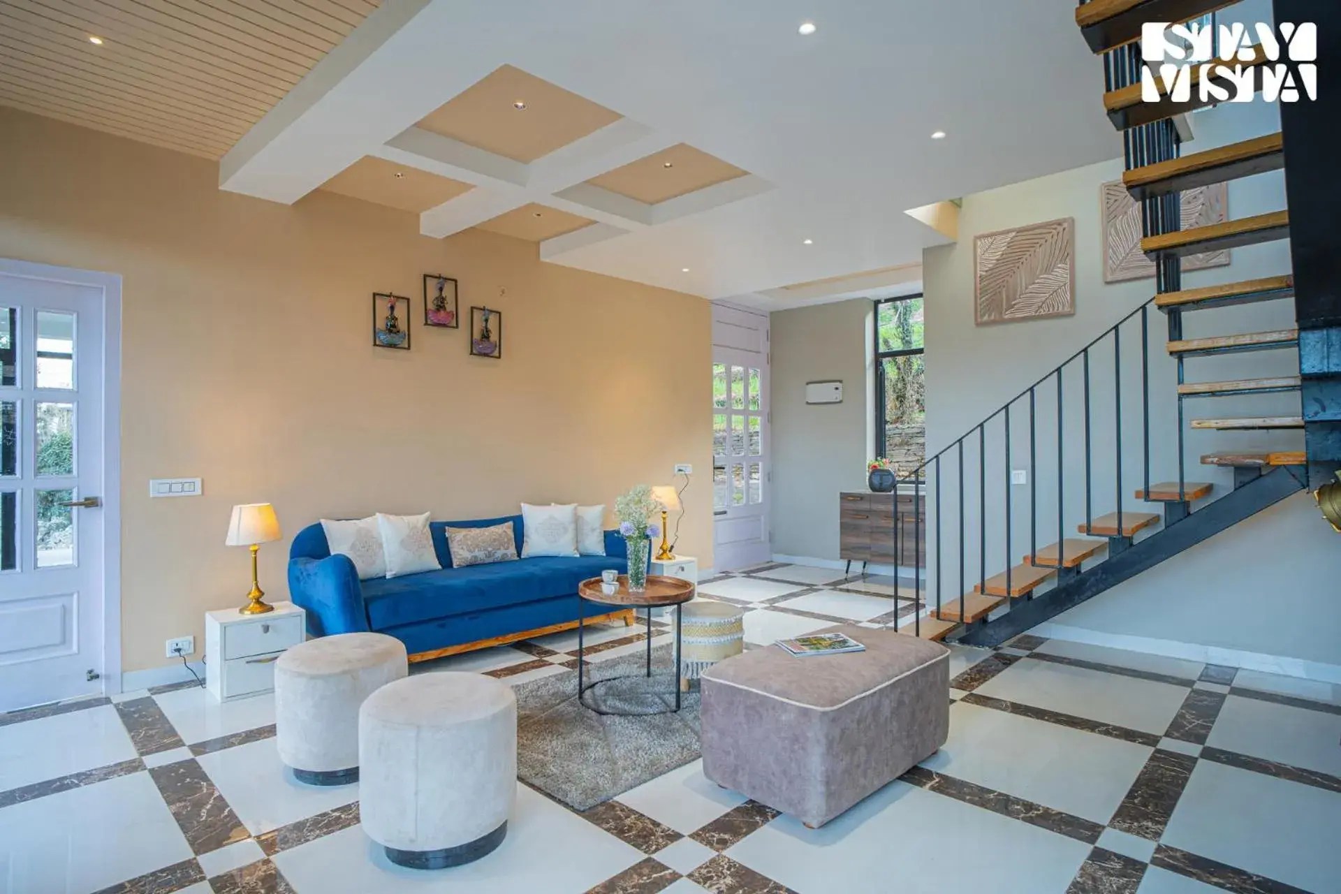 Living room in StayVista at Mountain Melody with Heater & Indoor-Outdoor Games Living room in StayVista at Mountain Melody with Heater & Indoor-Outdoor Games