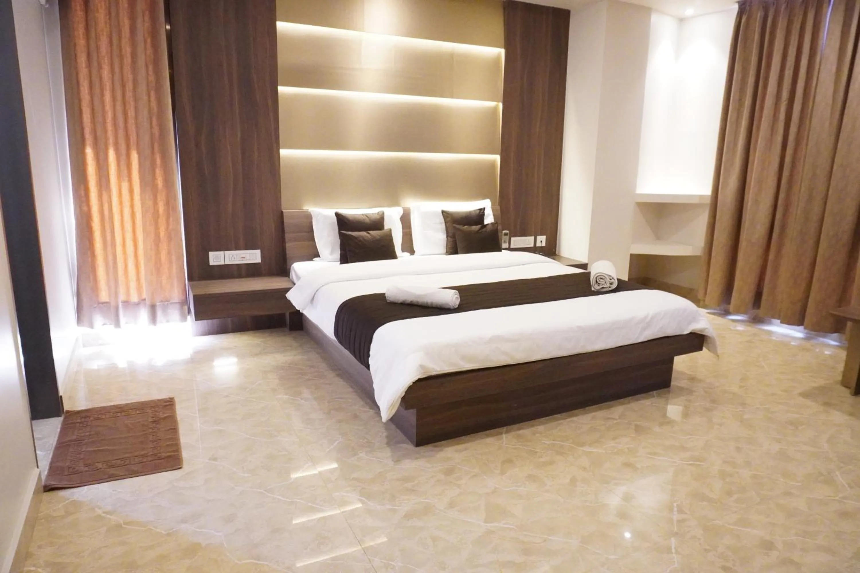 Photo of the whole room, Bed in HSM Grand Inn, Chittoor