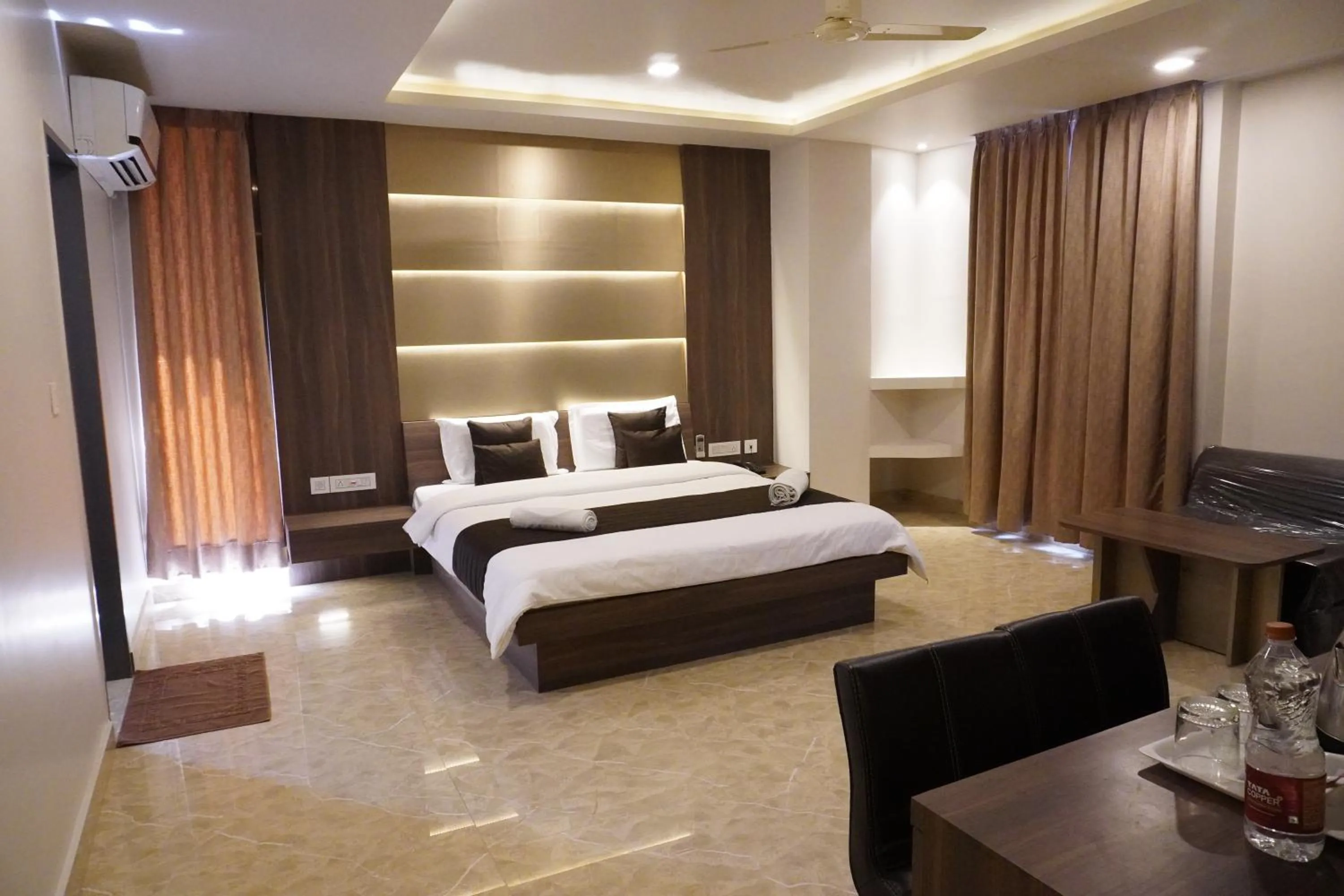 Photo of the whole room, Bed in HSM Grand Inn, Chittoor