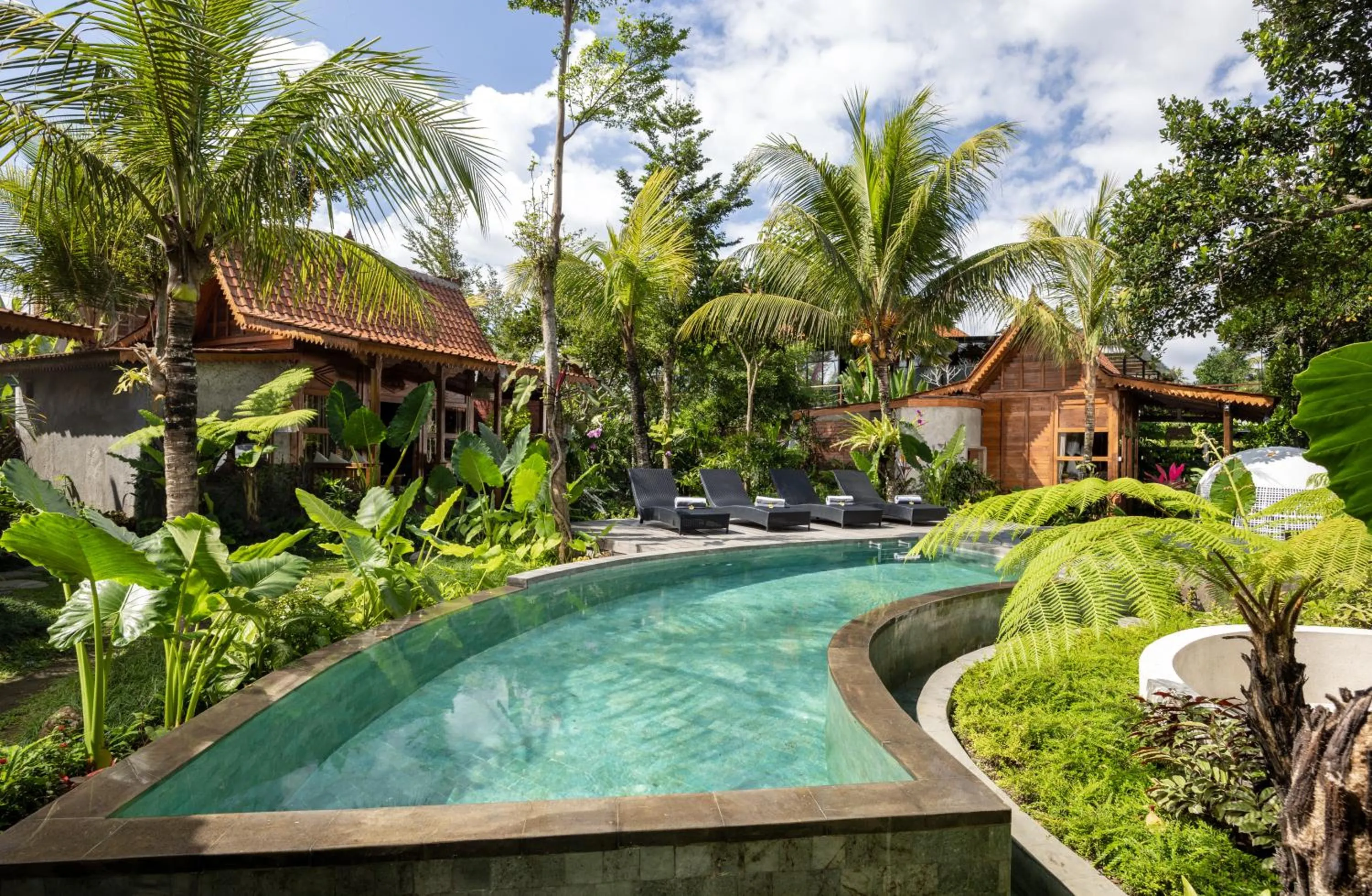 Pool view in Berlima Wooden Lodge by GenuineHost