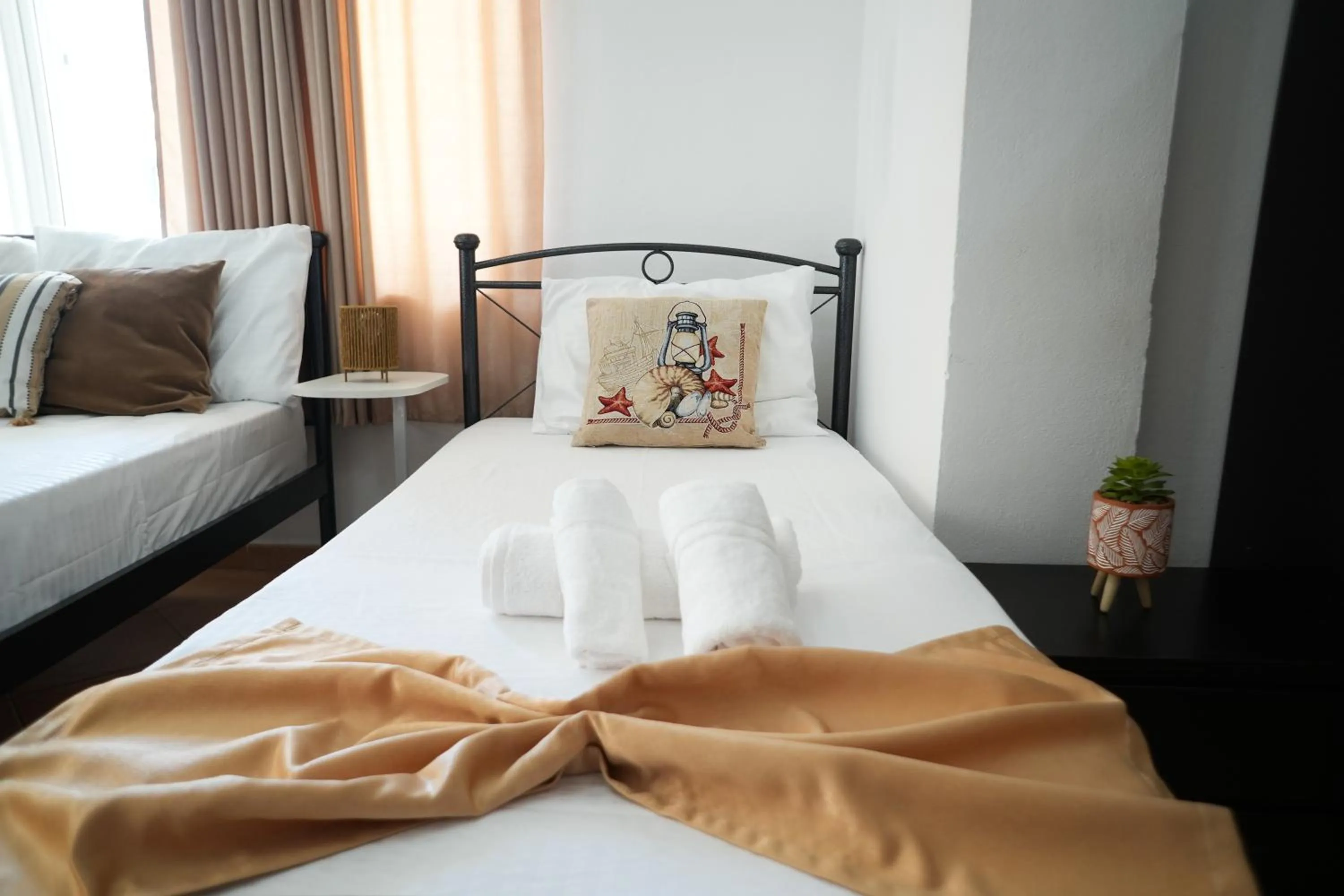 Bed in Saranda Waterside Apartments