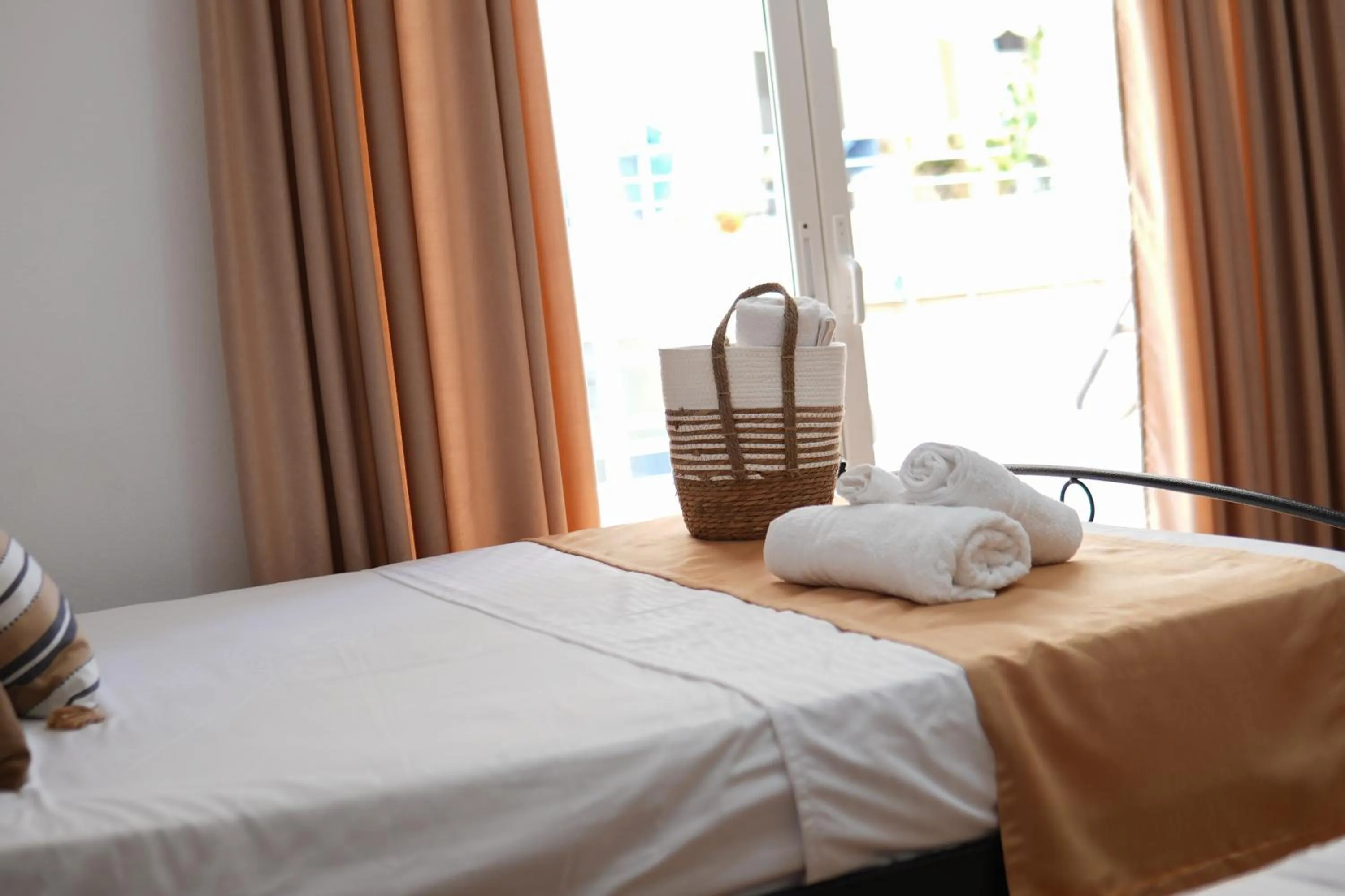 Bed in Saranda Waterside Apartments