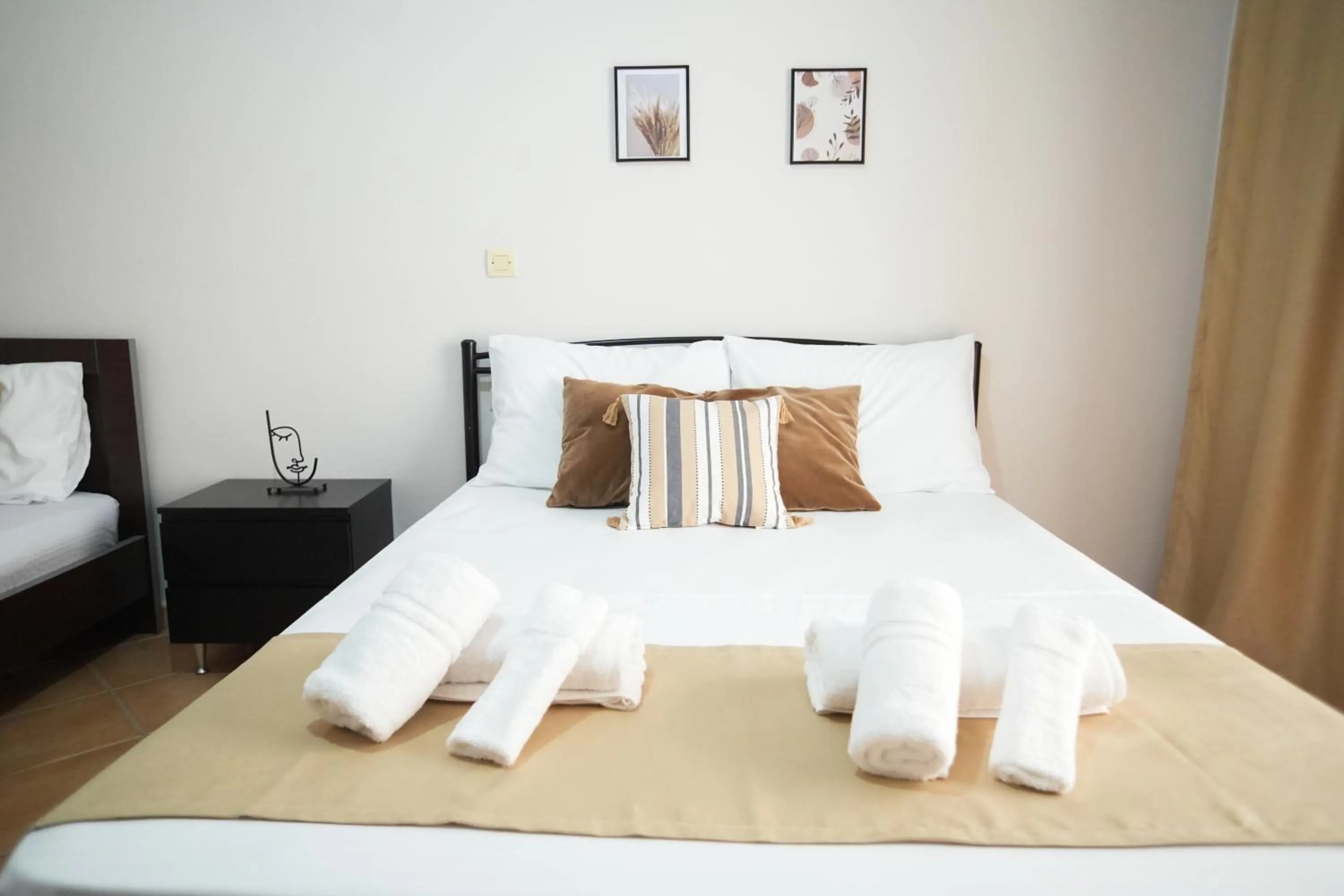 Bed in Saranda Waterside Apartments