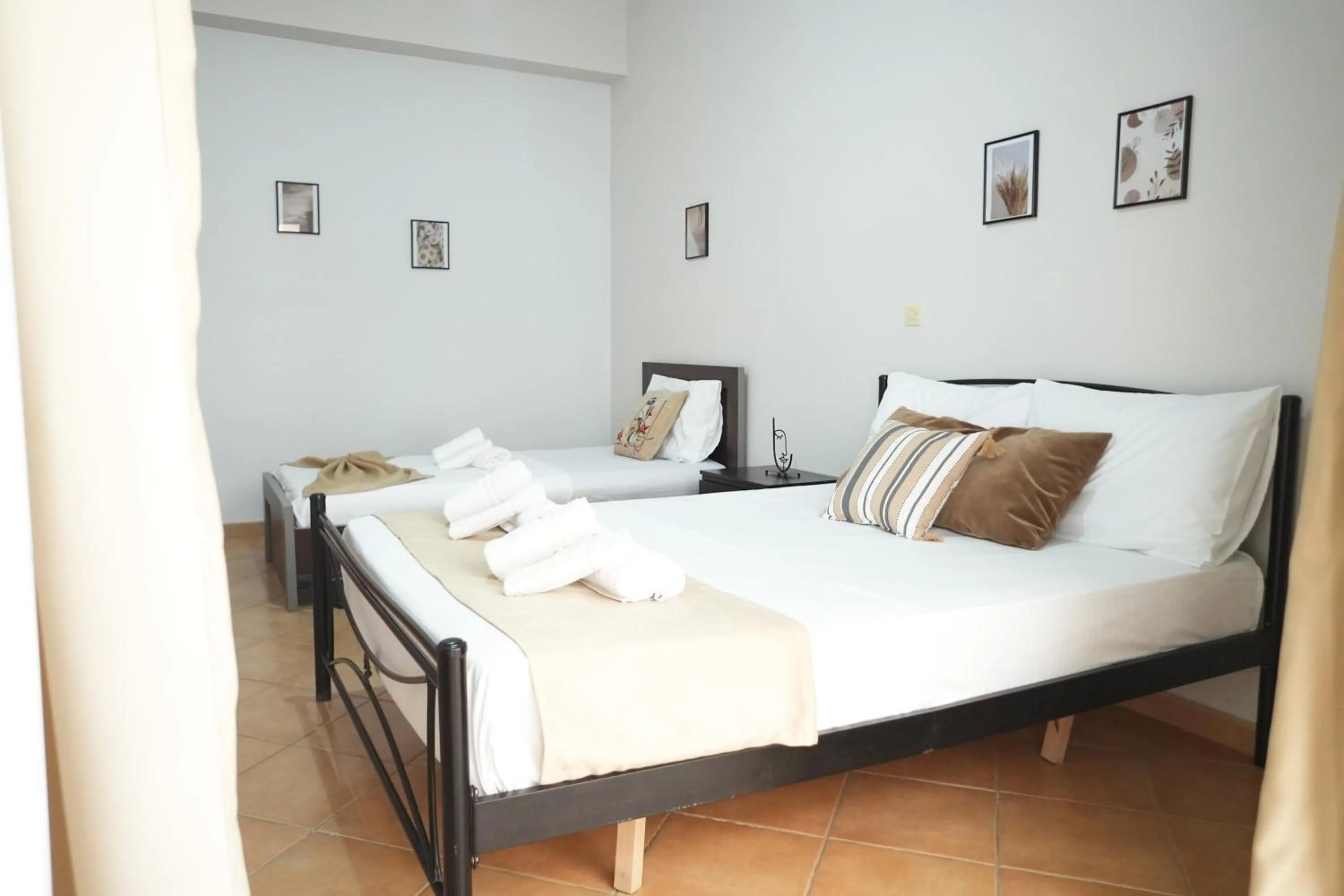 Bed in Saranda Waterside Apartments