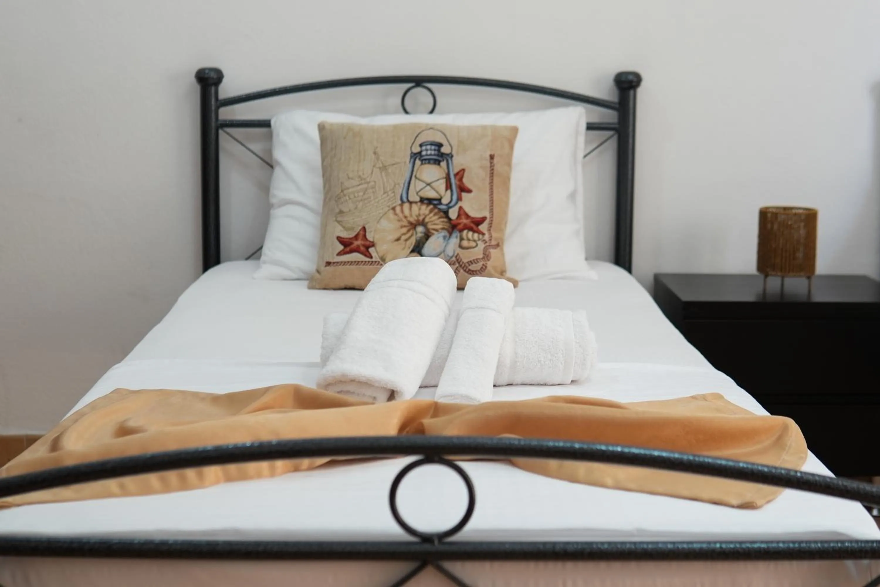 Bed in Saranda Waterside Apartments