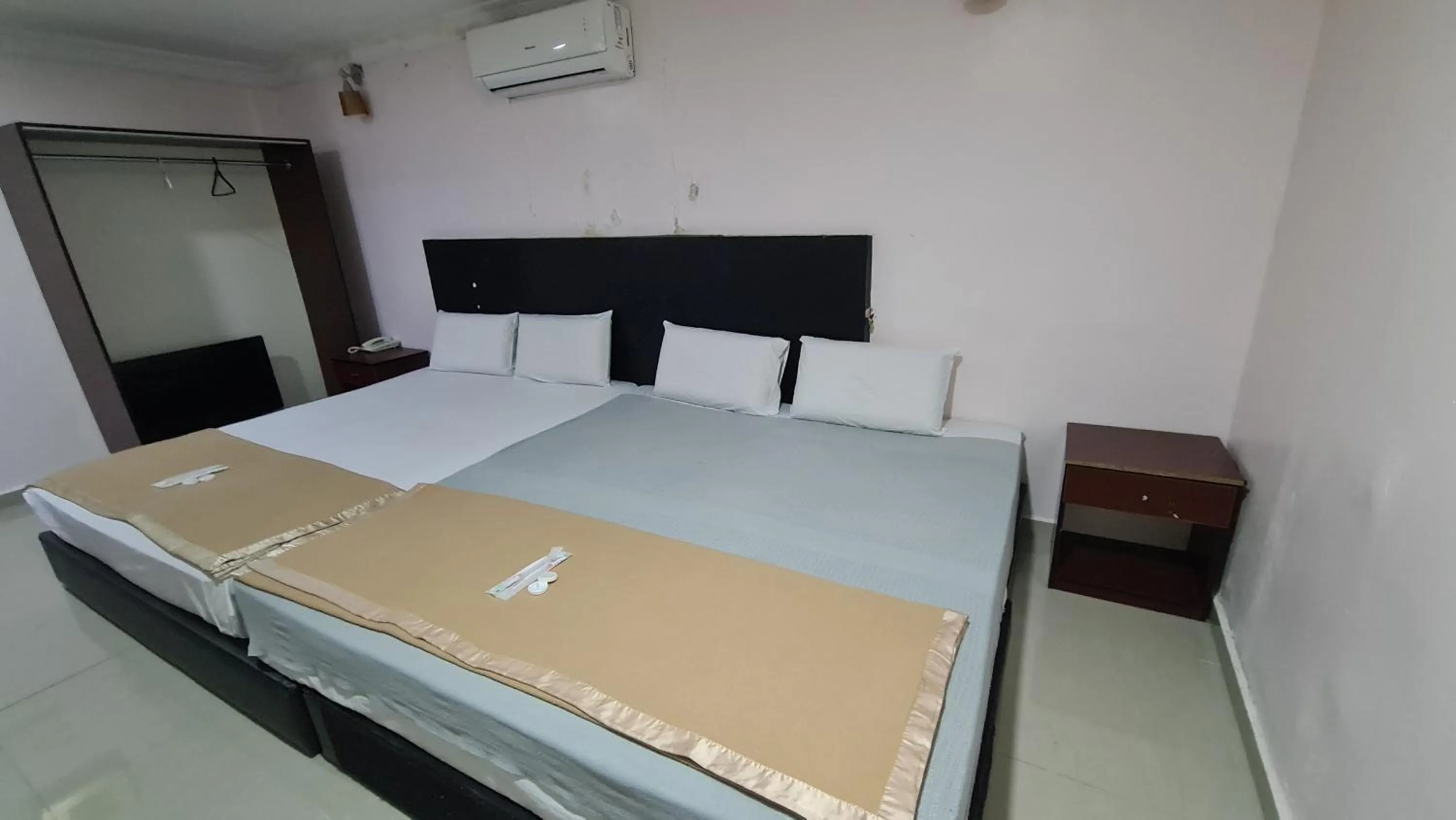 Bed in SP Venture Boutique Hotel