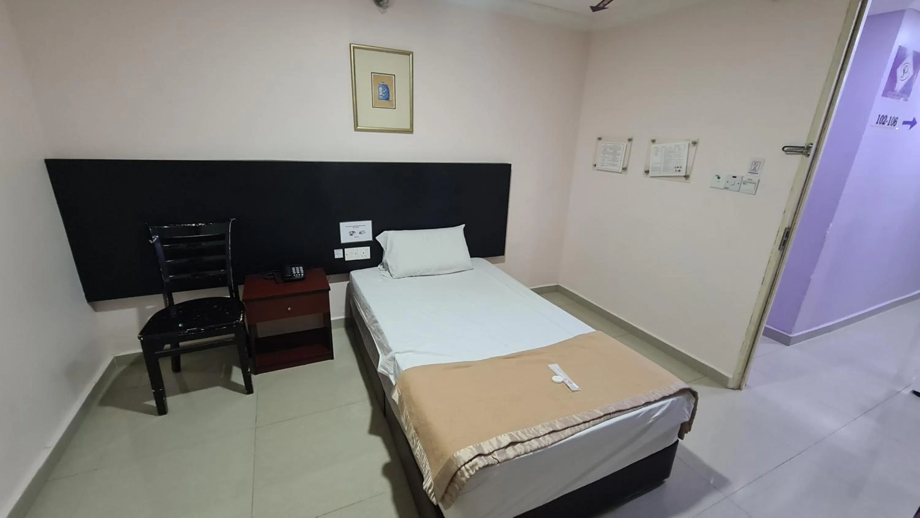 Bed in SP Venture Boutique Hotel