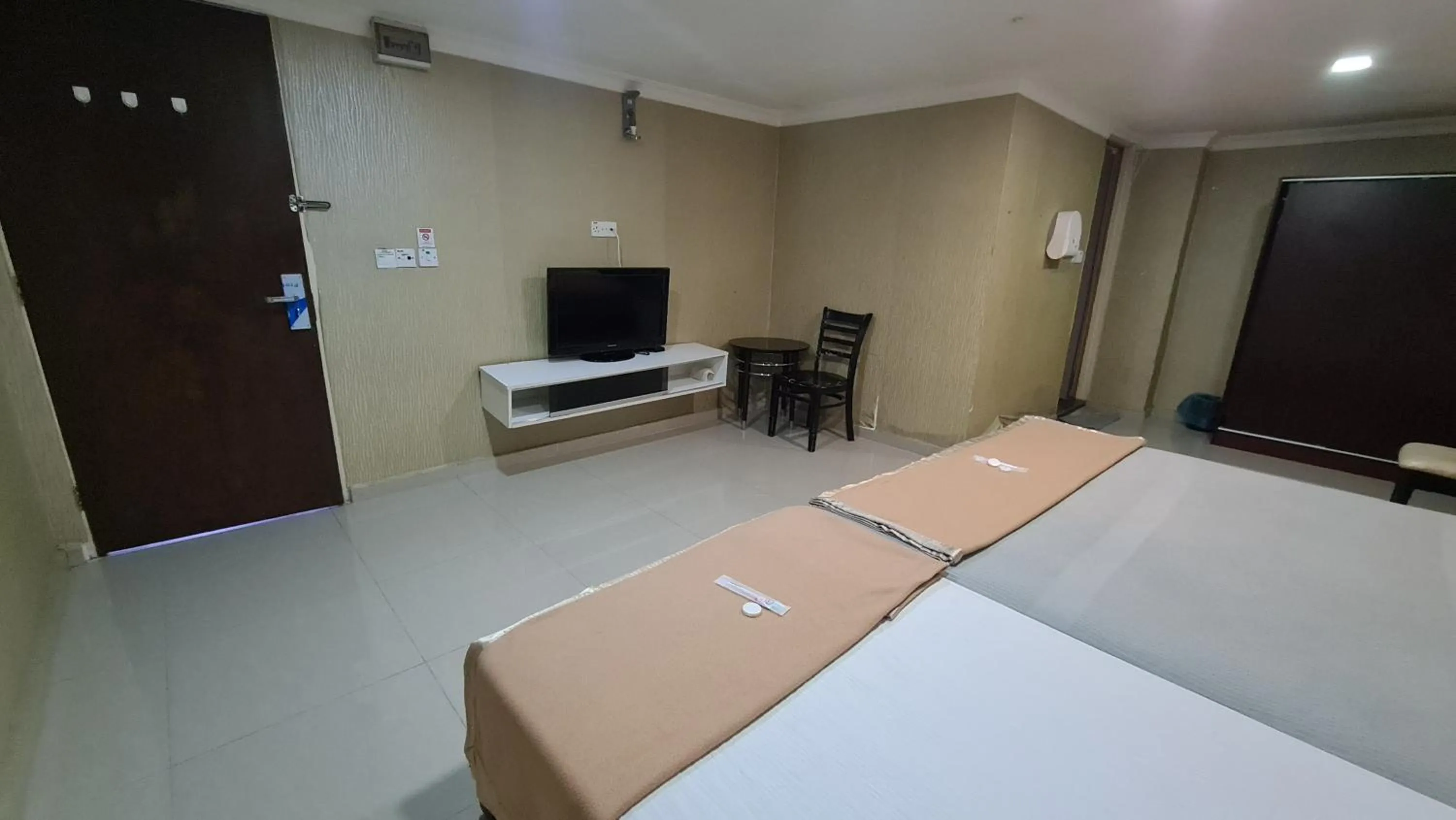 Bed in SP Venture Boutique Hotel