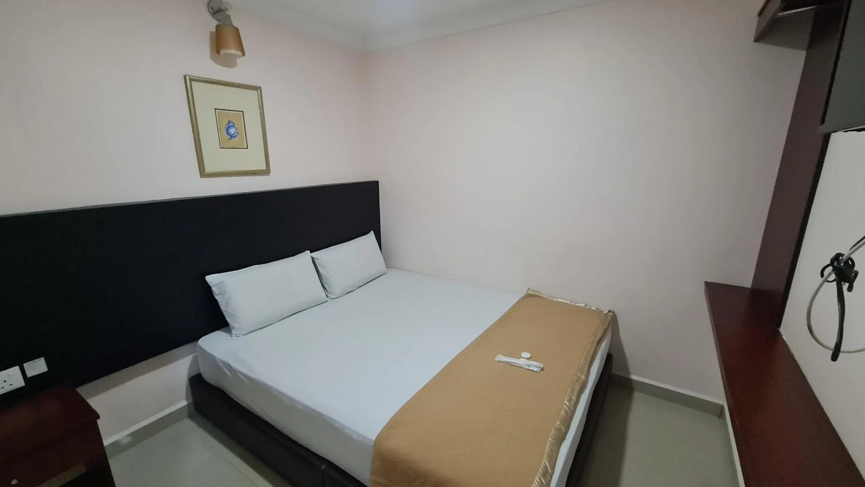 Bed in SP Venture Boutique Hotel