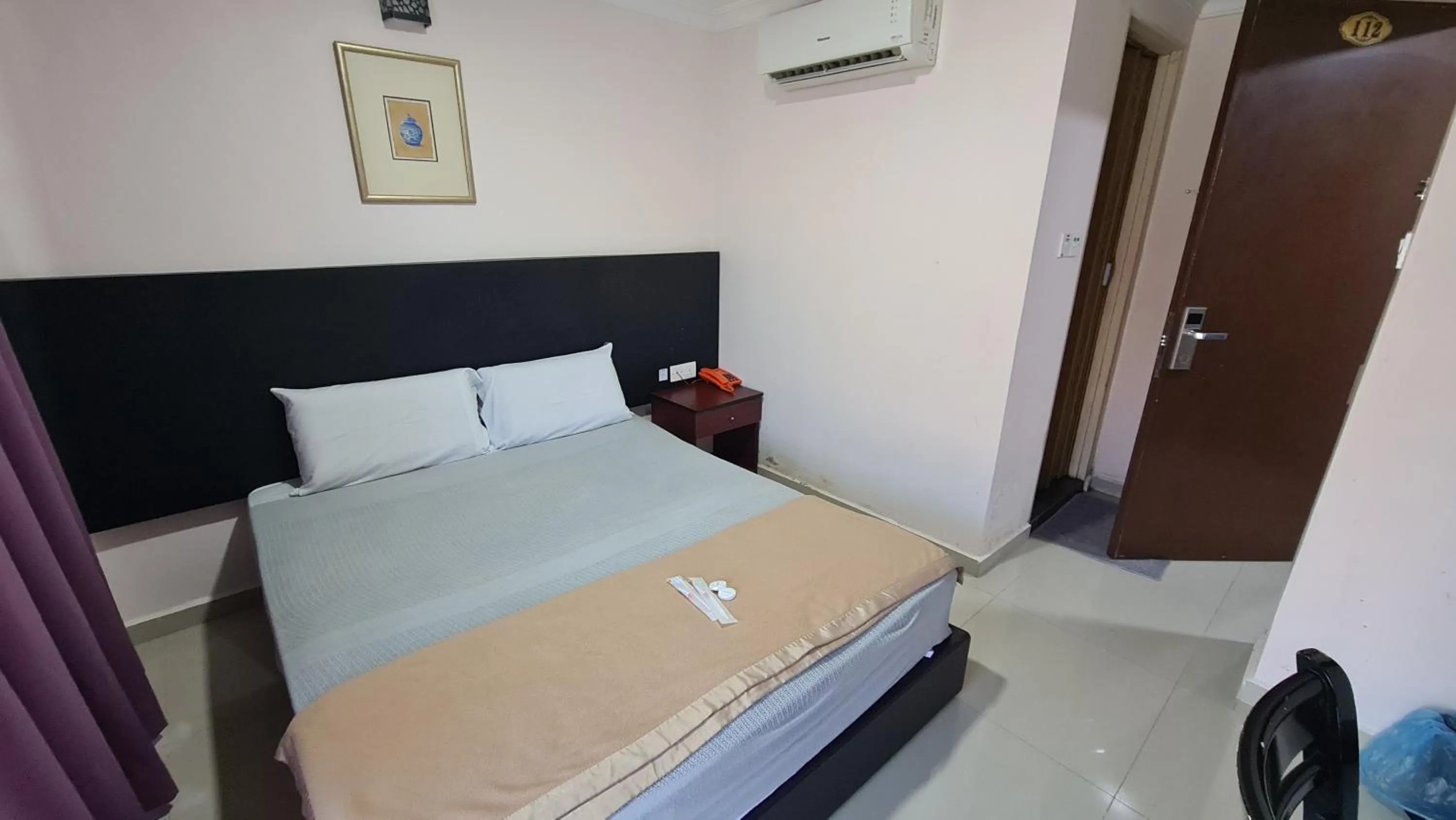 Bed in SP Venture Boutique Hotel