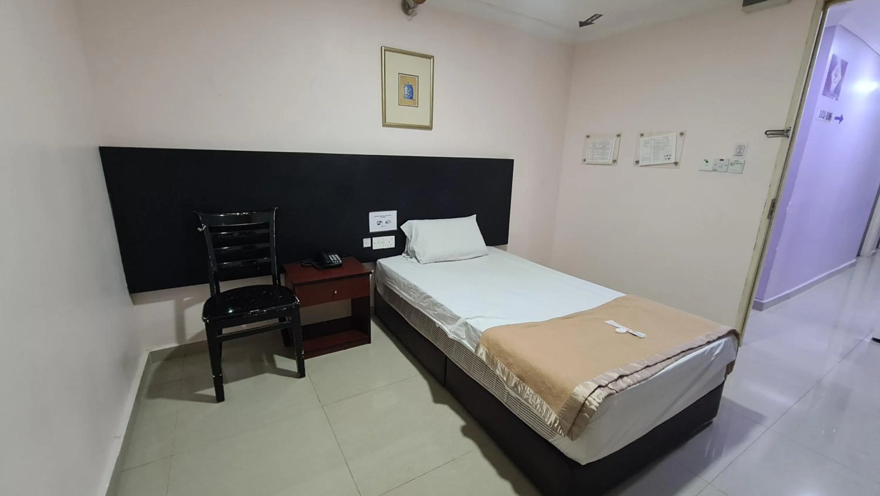 Bed in SP Venture Boutique Hotel