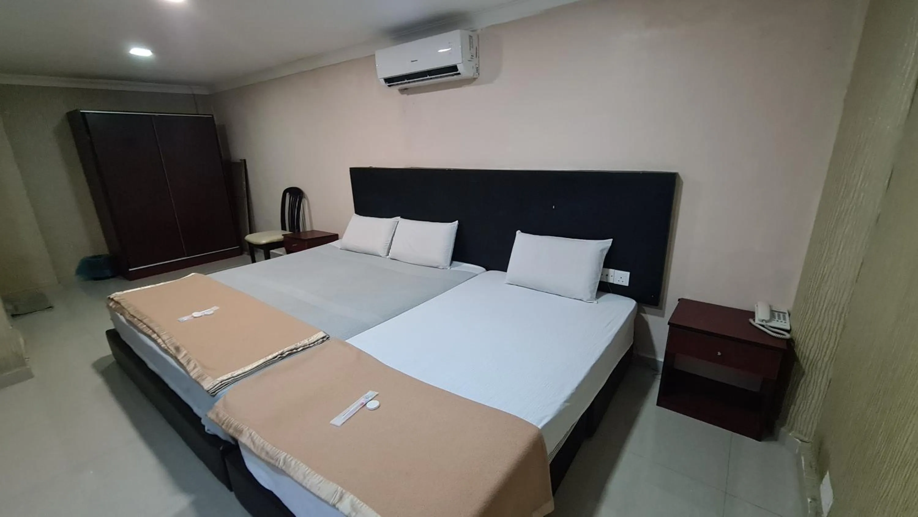 Bed in SP Venture Boutique Hotel