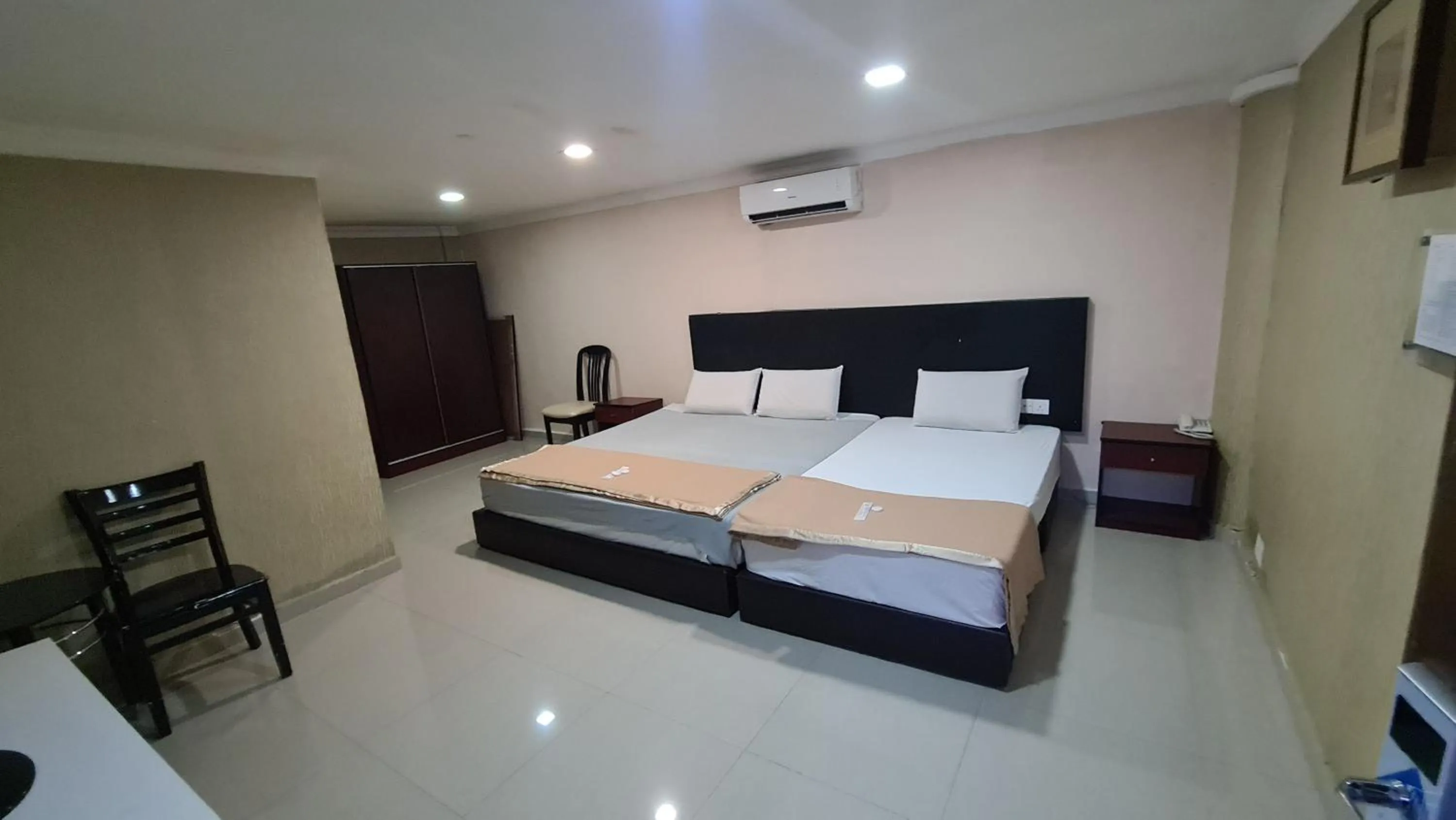 Bed in SP Venture Boutique Hotel