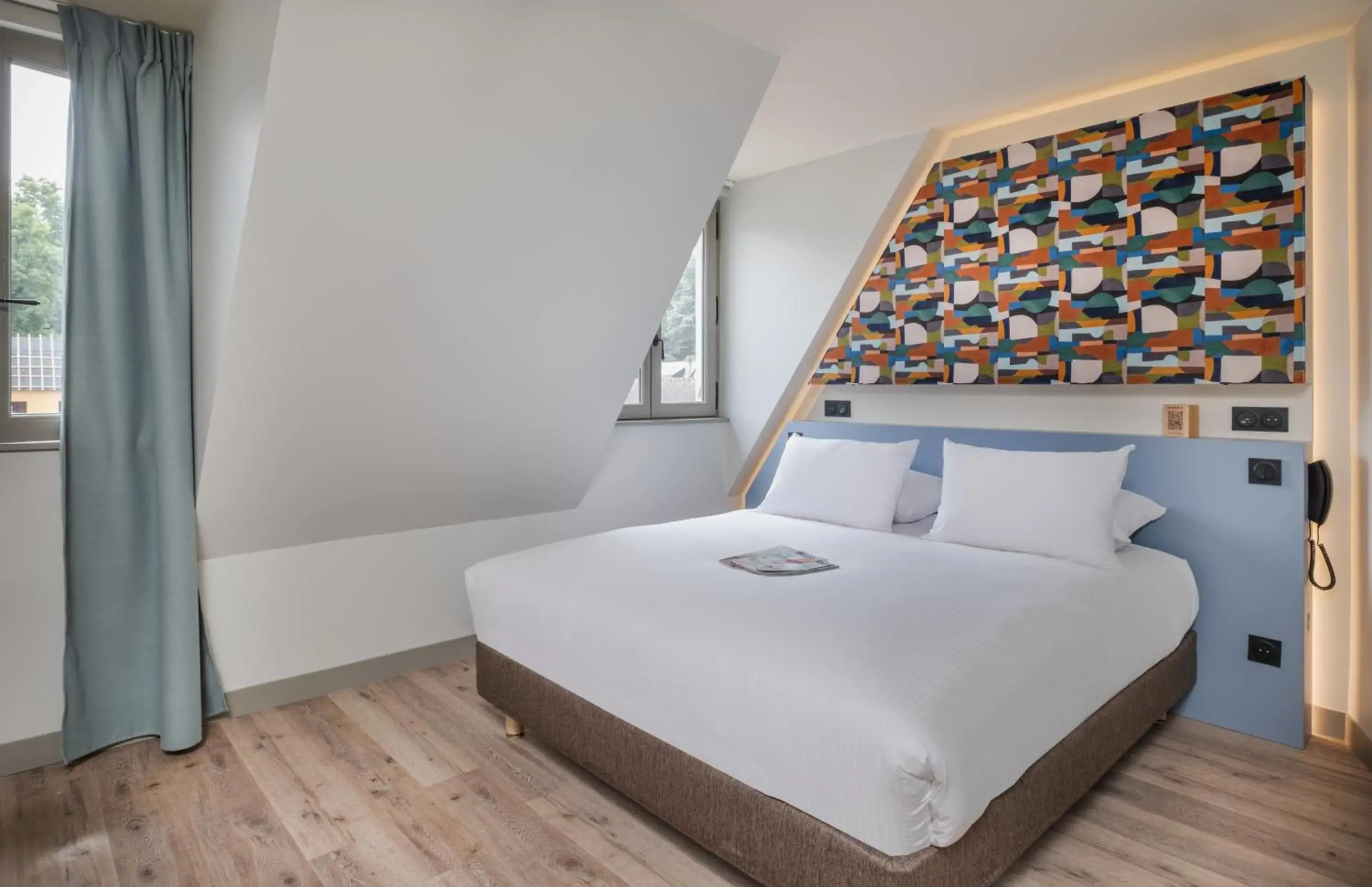 Bed in La Maison Rabelais Bed in La Maison Rabelais