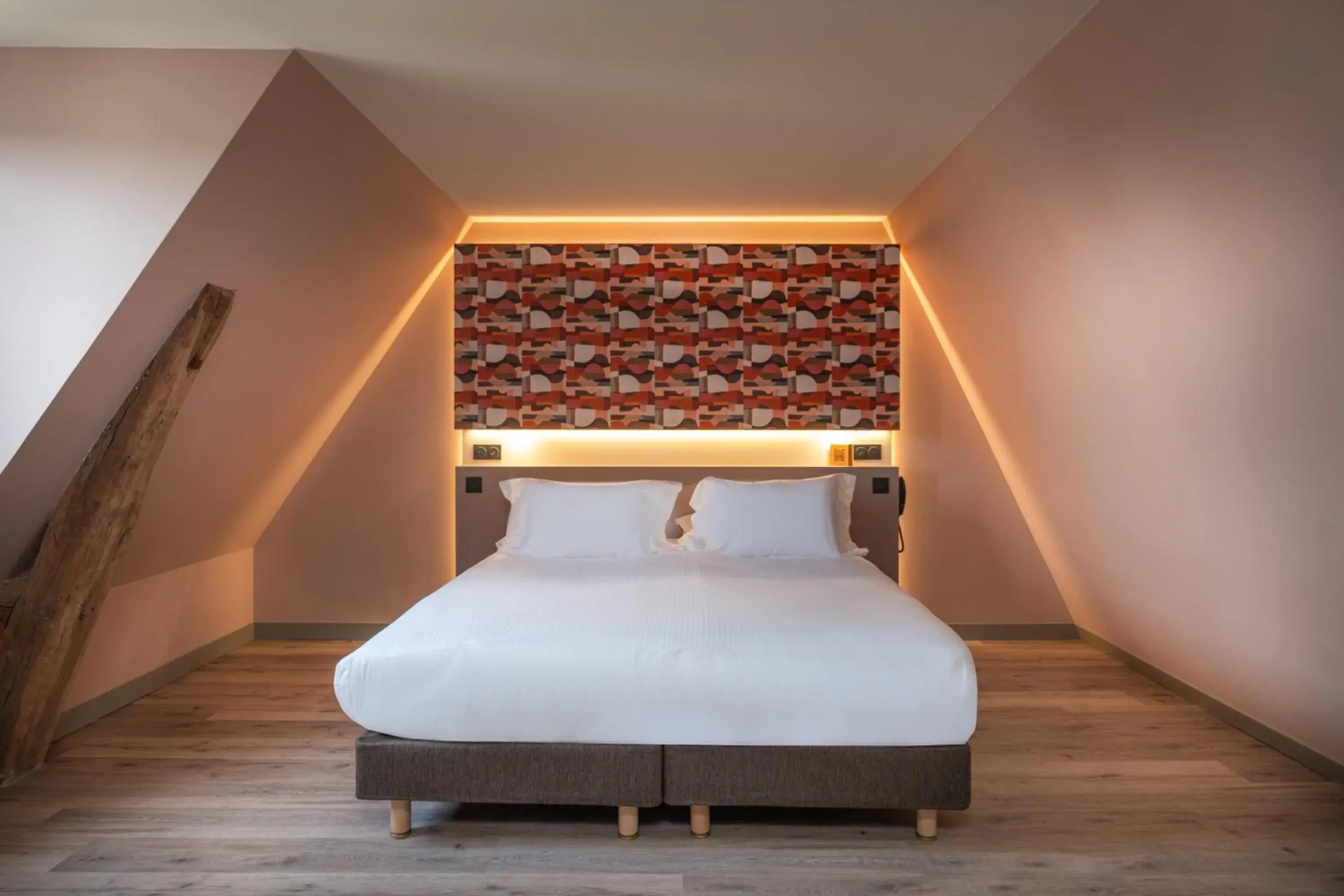 Bed in La Maison Rabelais Bed in La Maison Rabelais