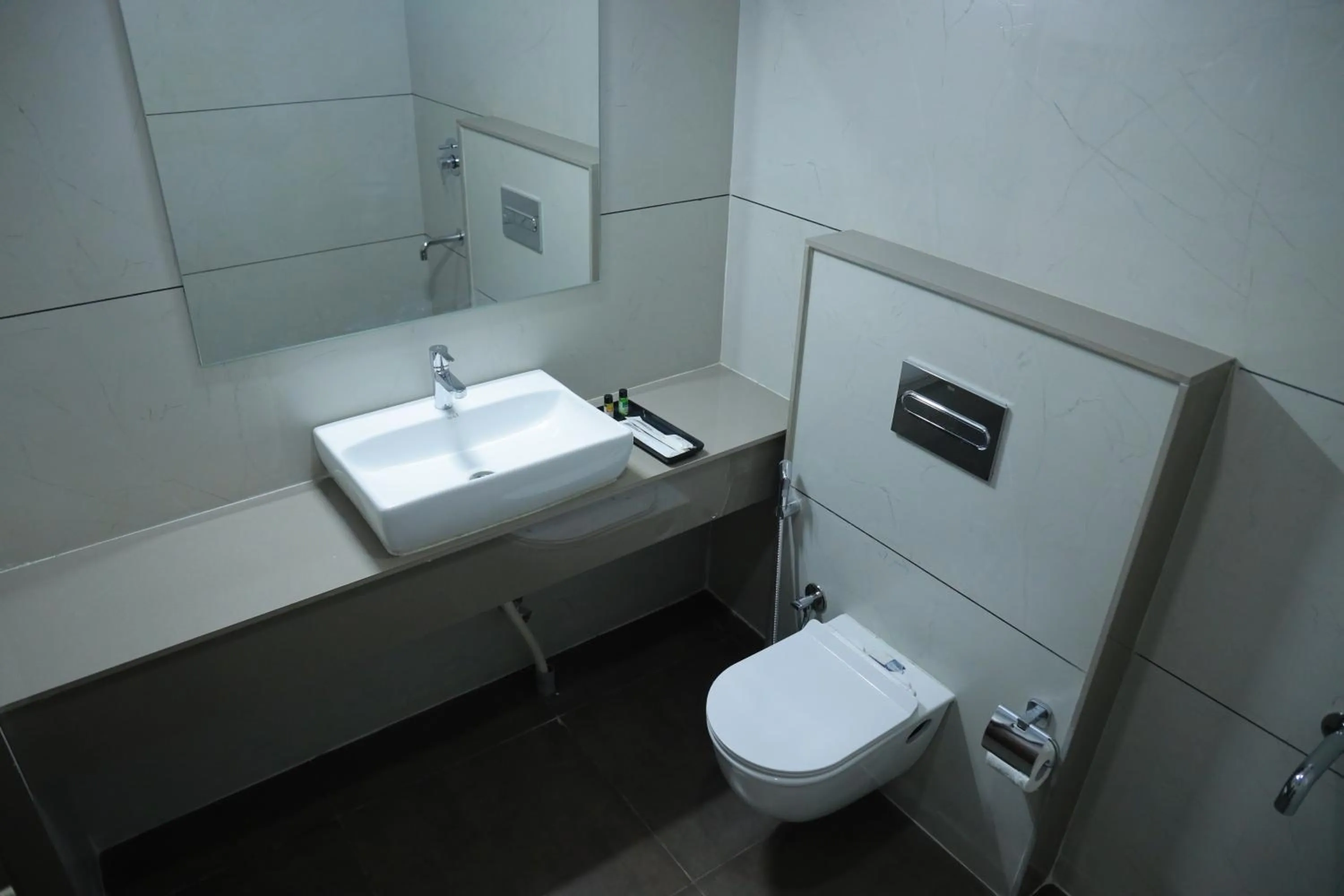 Shower in Silverkey Hotel Yelahanka