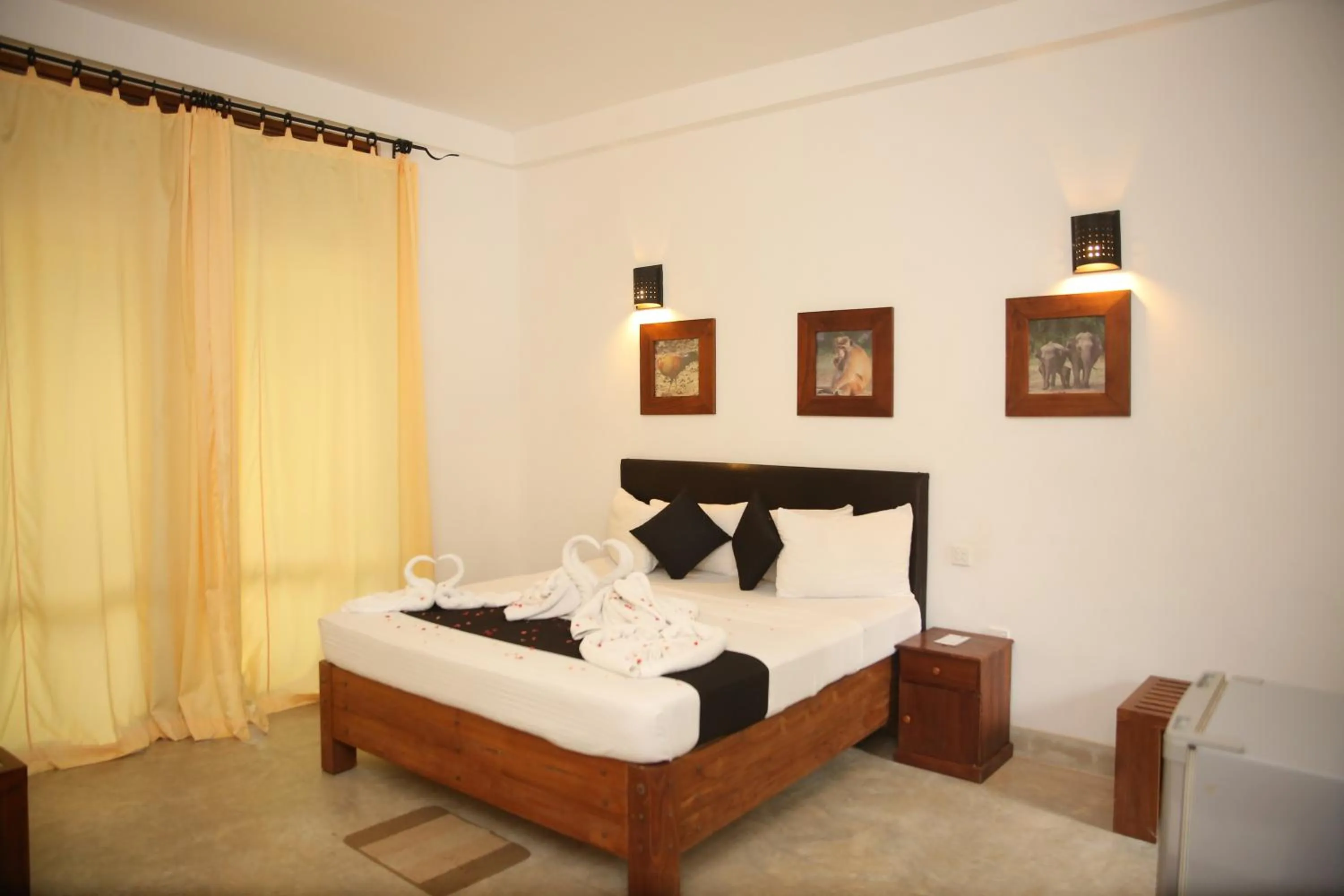 Bed in Nil Diya Mankada Safari Lodge