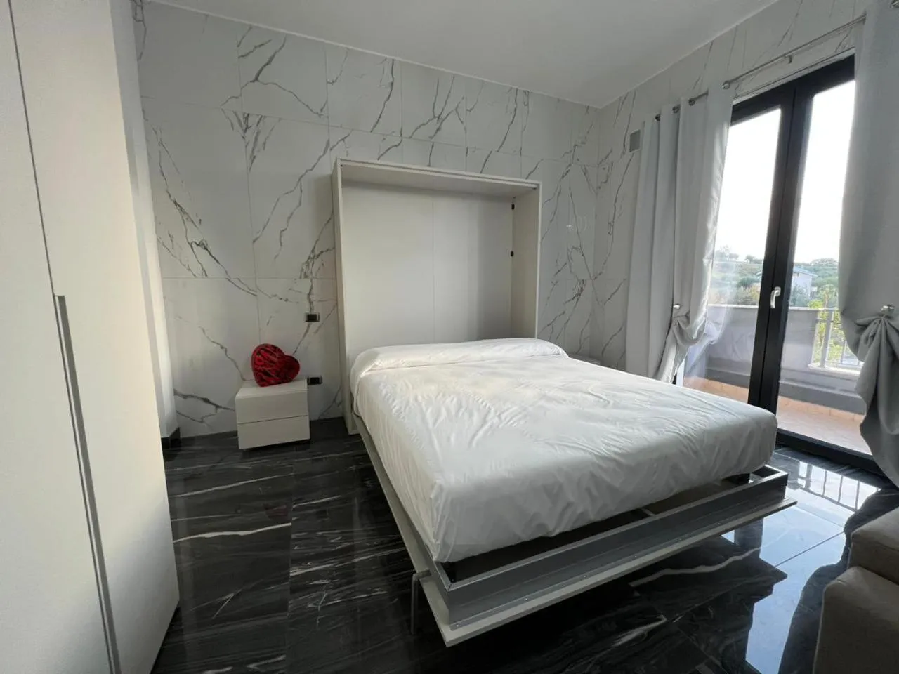 Bed in RESIDENCE MARCO POLO