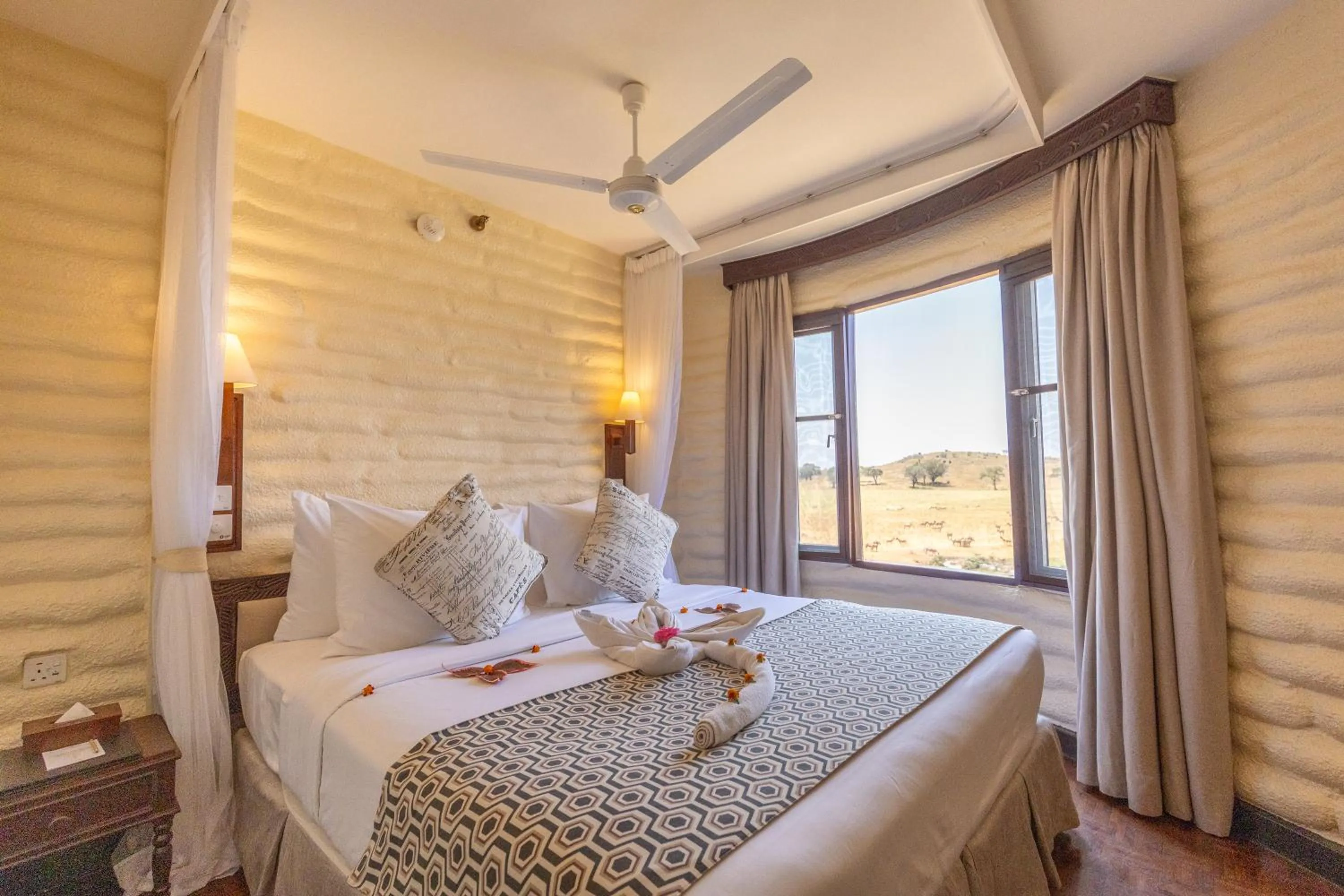 Bed in Salt Lick Safari Lodge