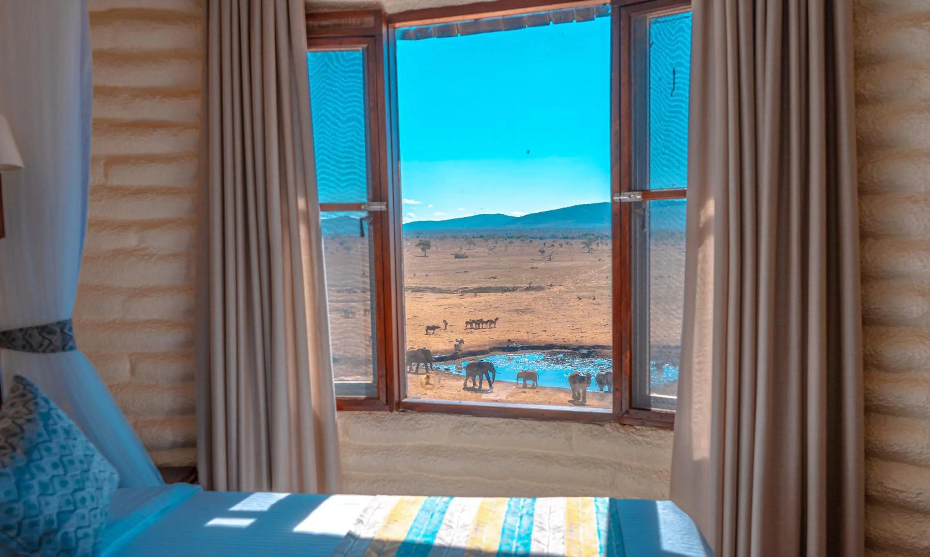Bed in Salt Lick Safari Lodge