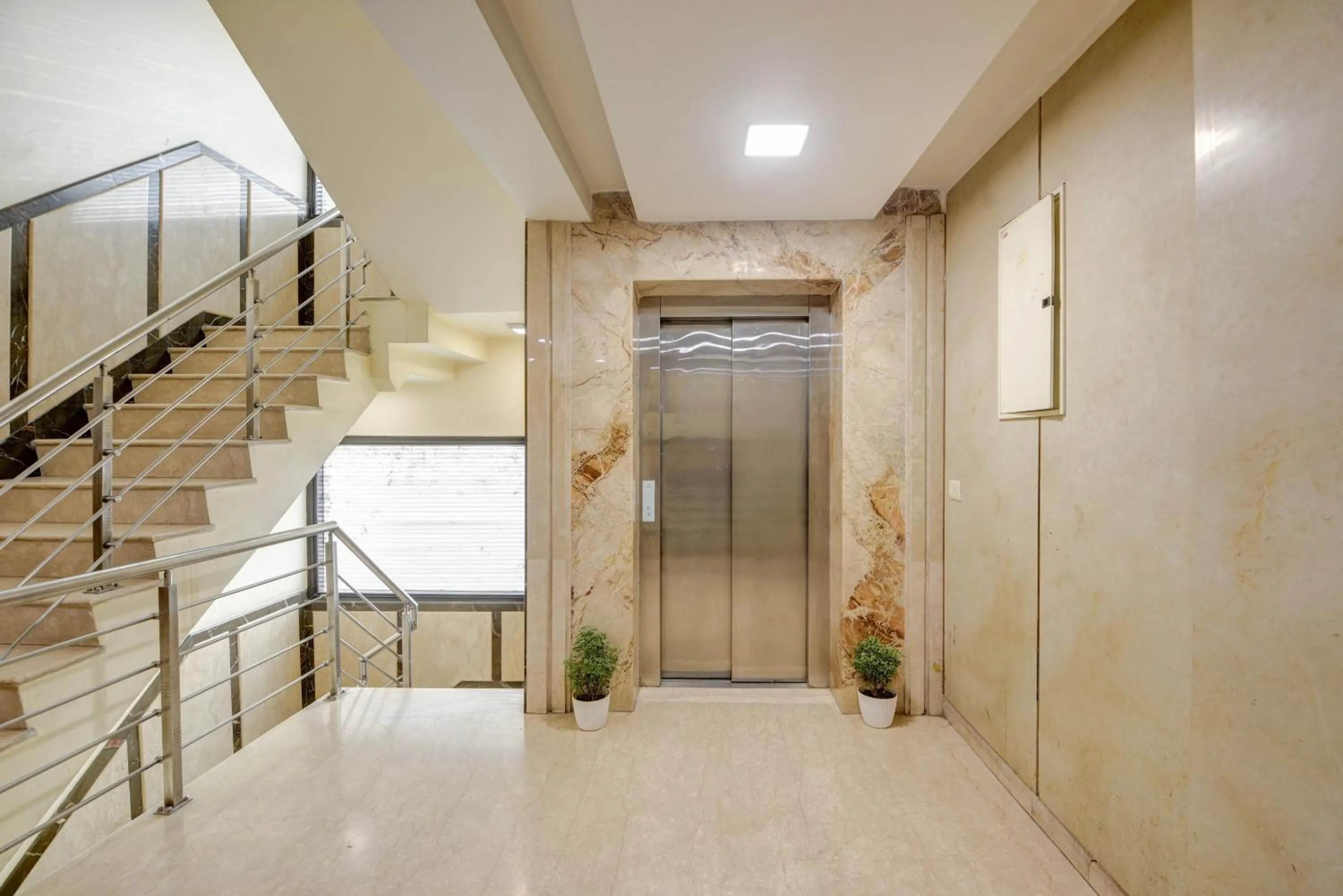 elevator in Qotel Signature Lavish Inn Rajouri Garden