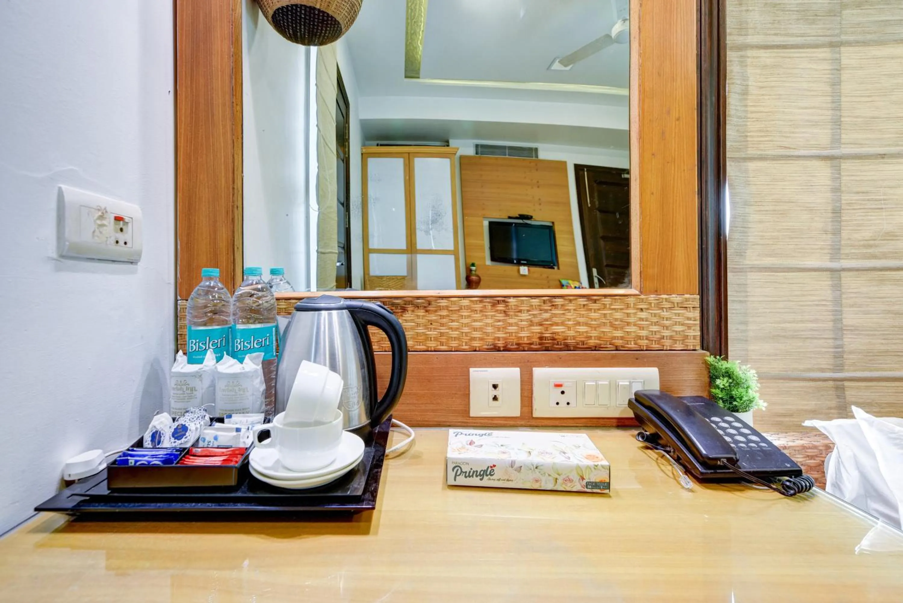 Kitchen or kitchenette in Qotel Signature Lavish Inn Rajouri Garden