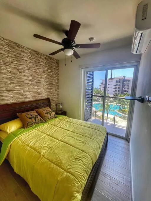 Bed in Playa Caracol Apartment
