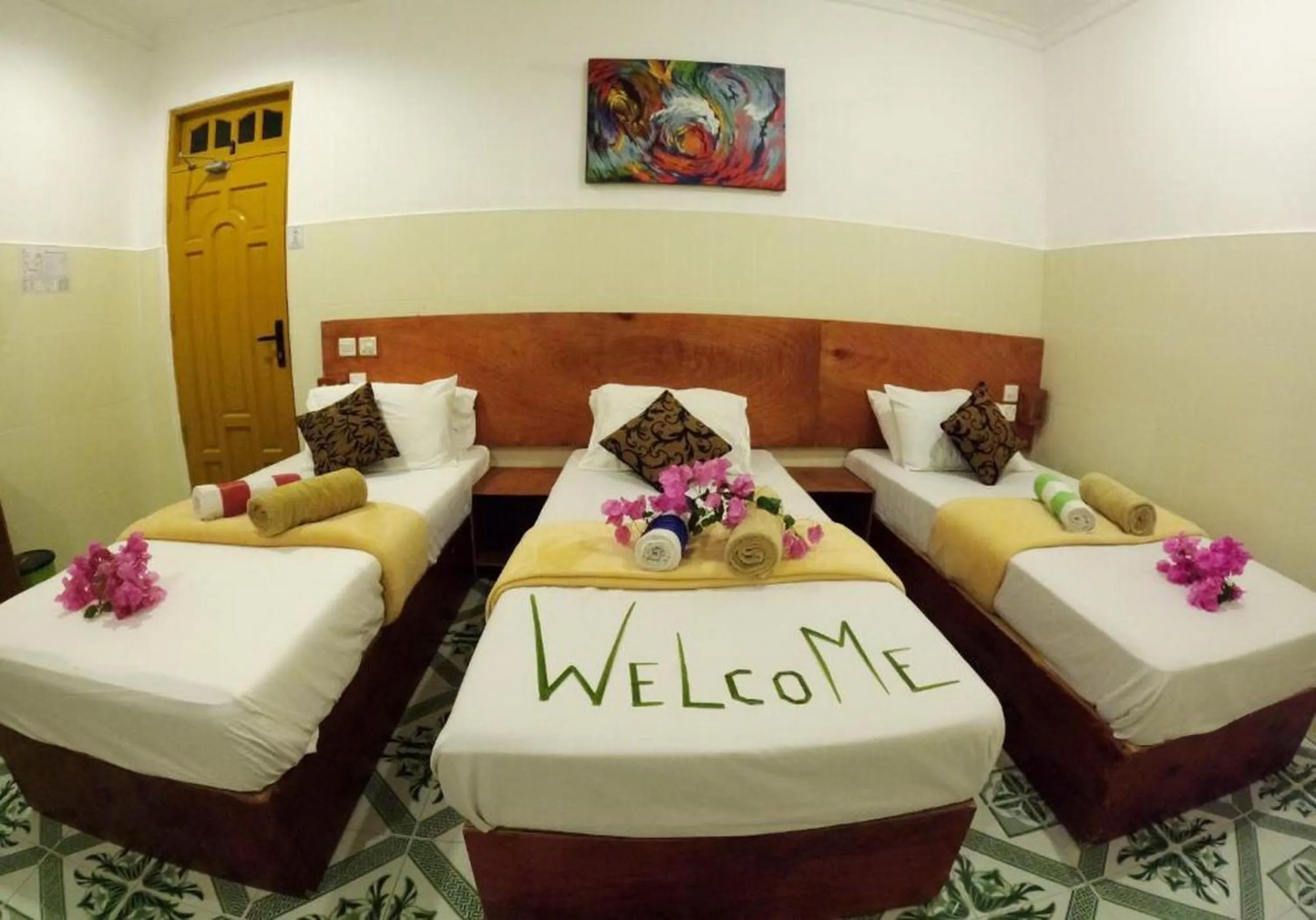 Bed in Adroit Beach Inn