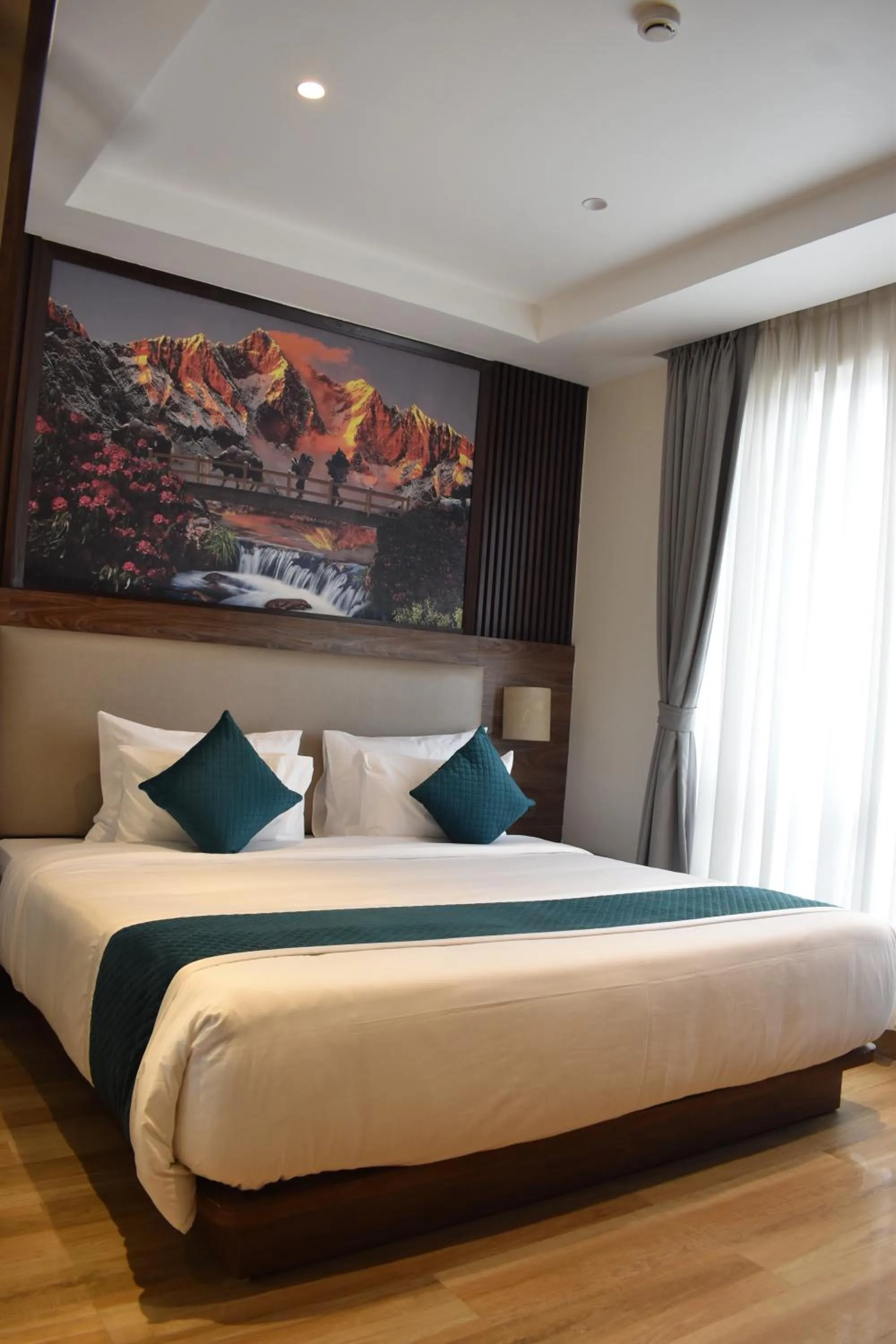 Bed in Dees Boutique Hotel