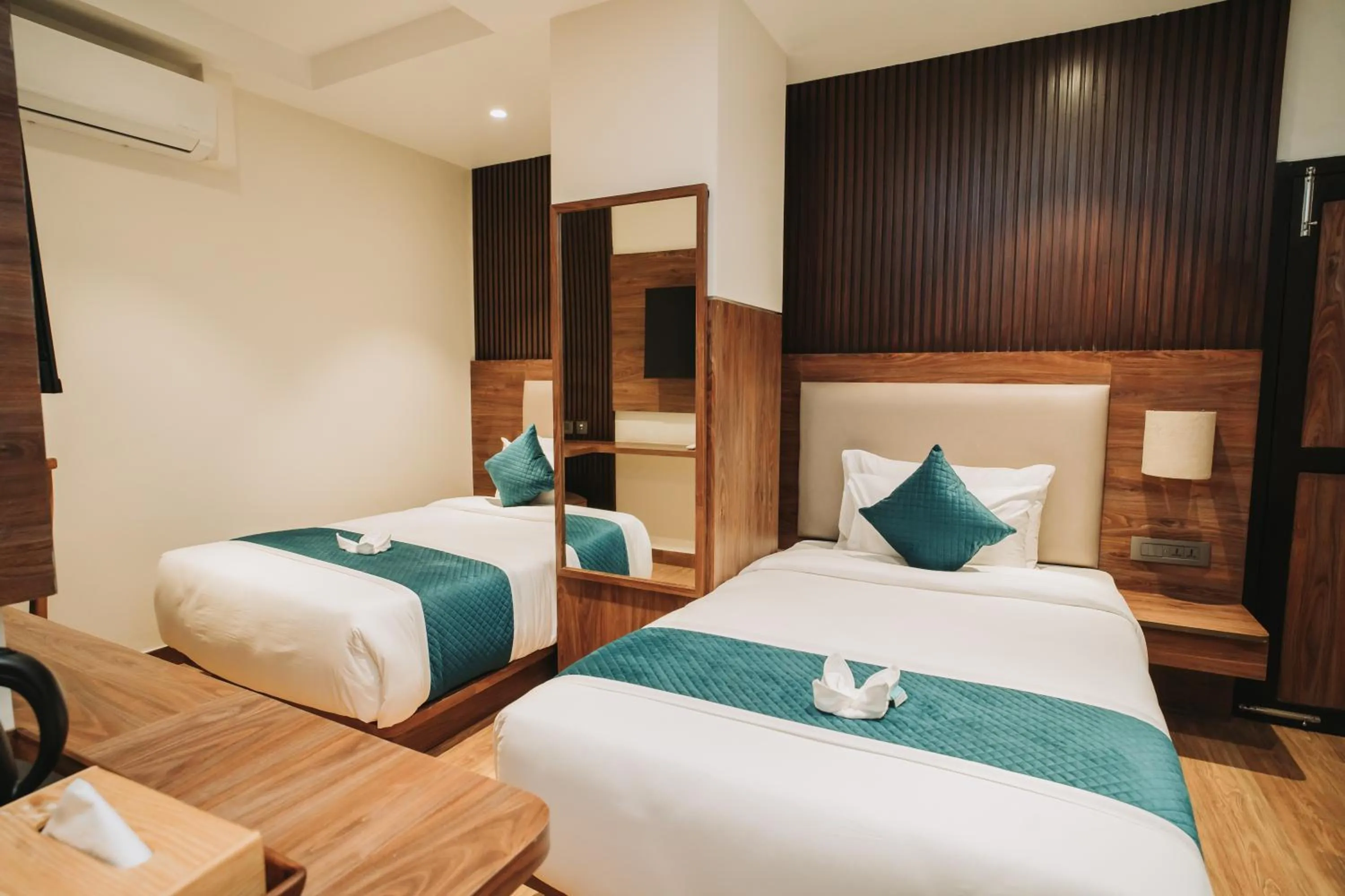 Bed in Dees Boutique Hotel