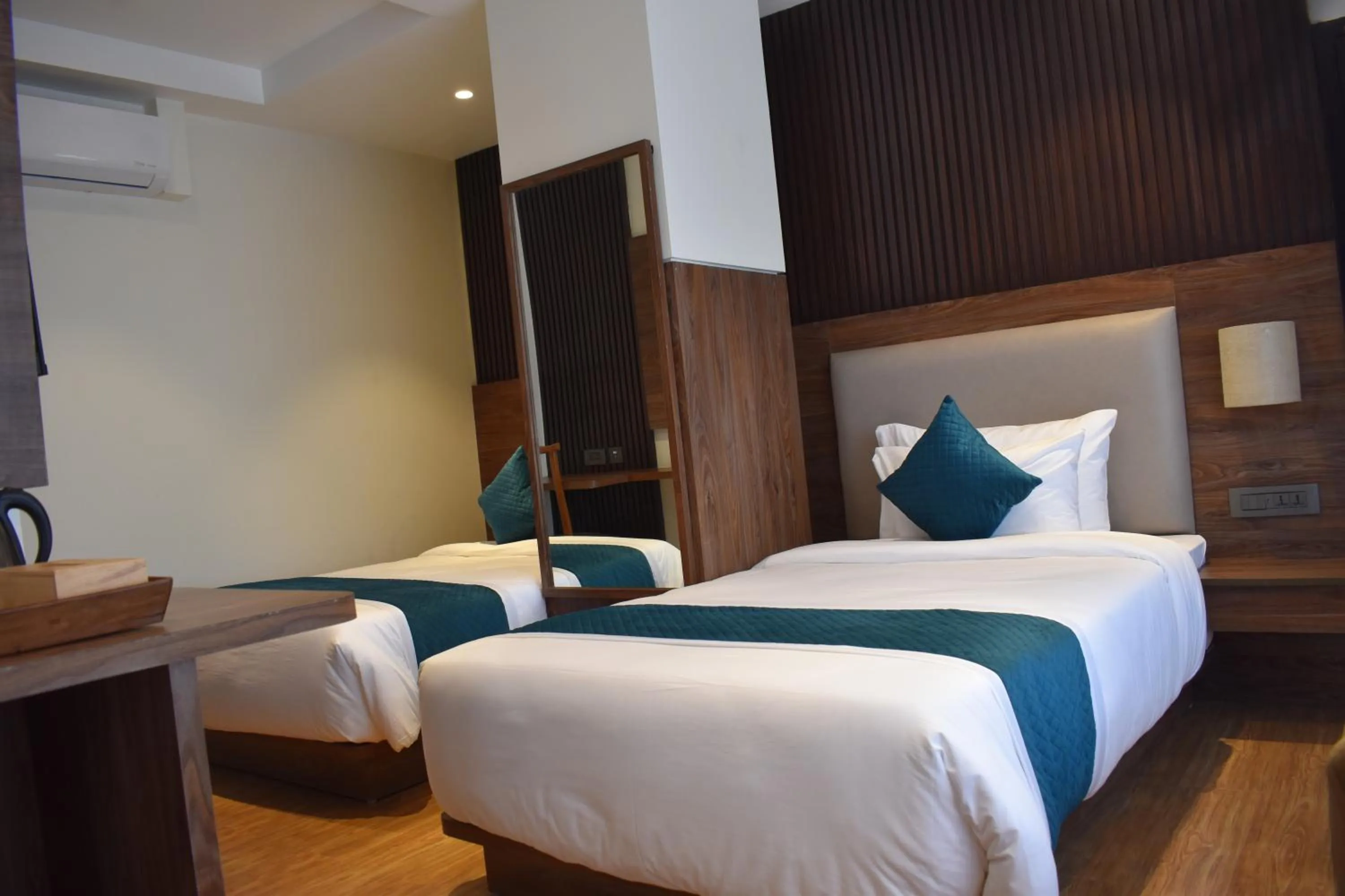 Bed in Dees Boutique Hotel